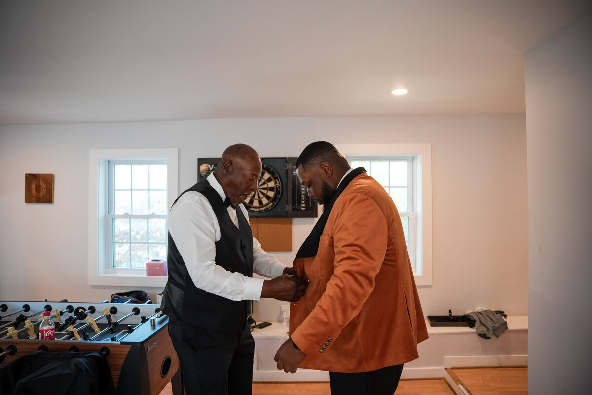 Groom getting ready before a Maryland wedding ceremony