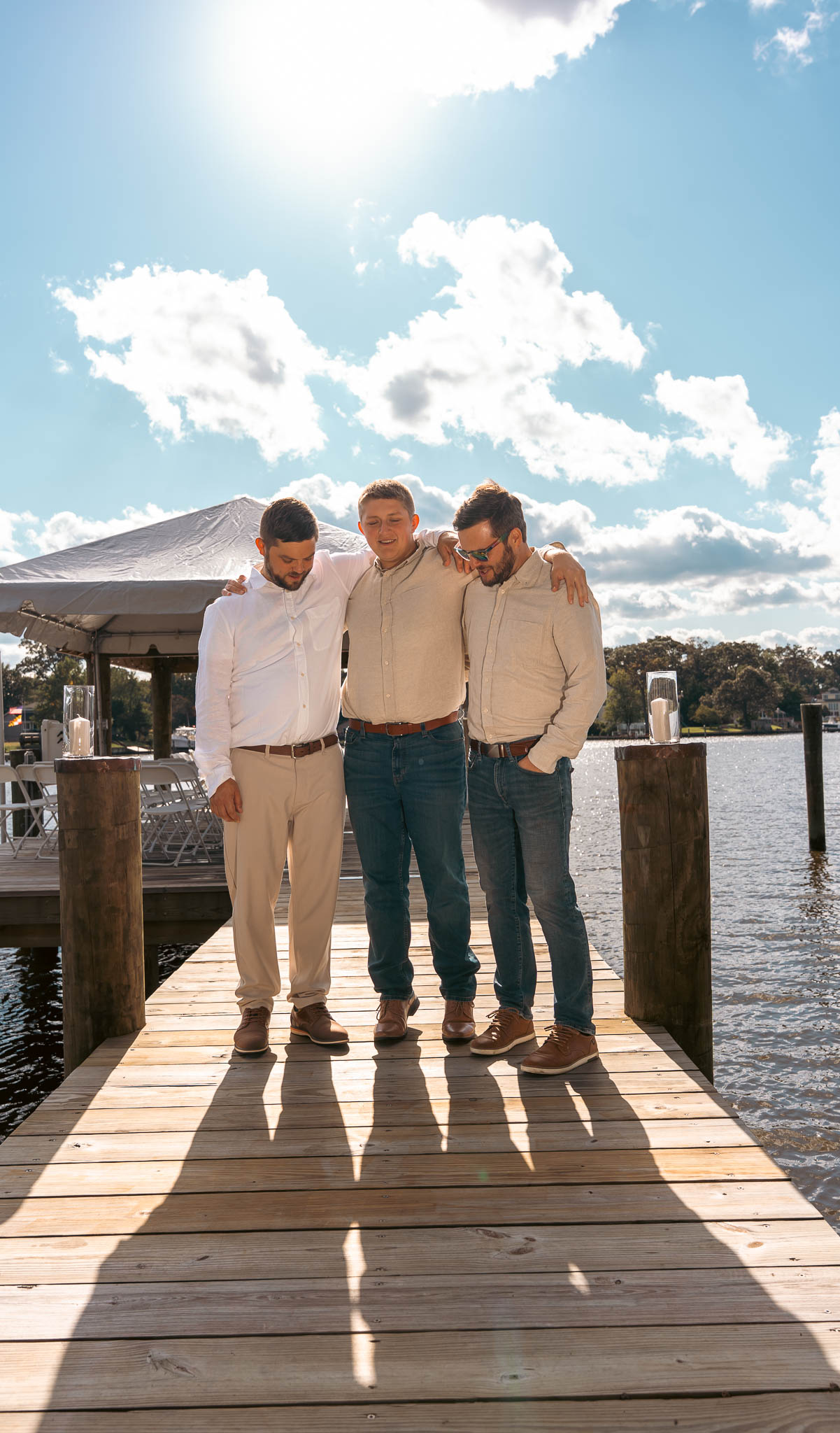 Groom and groomsmen on the dock before the ceremony — backyard wedding in Annapolis, Maryland