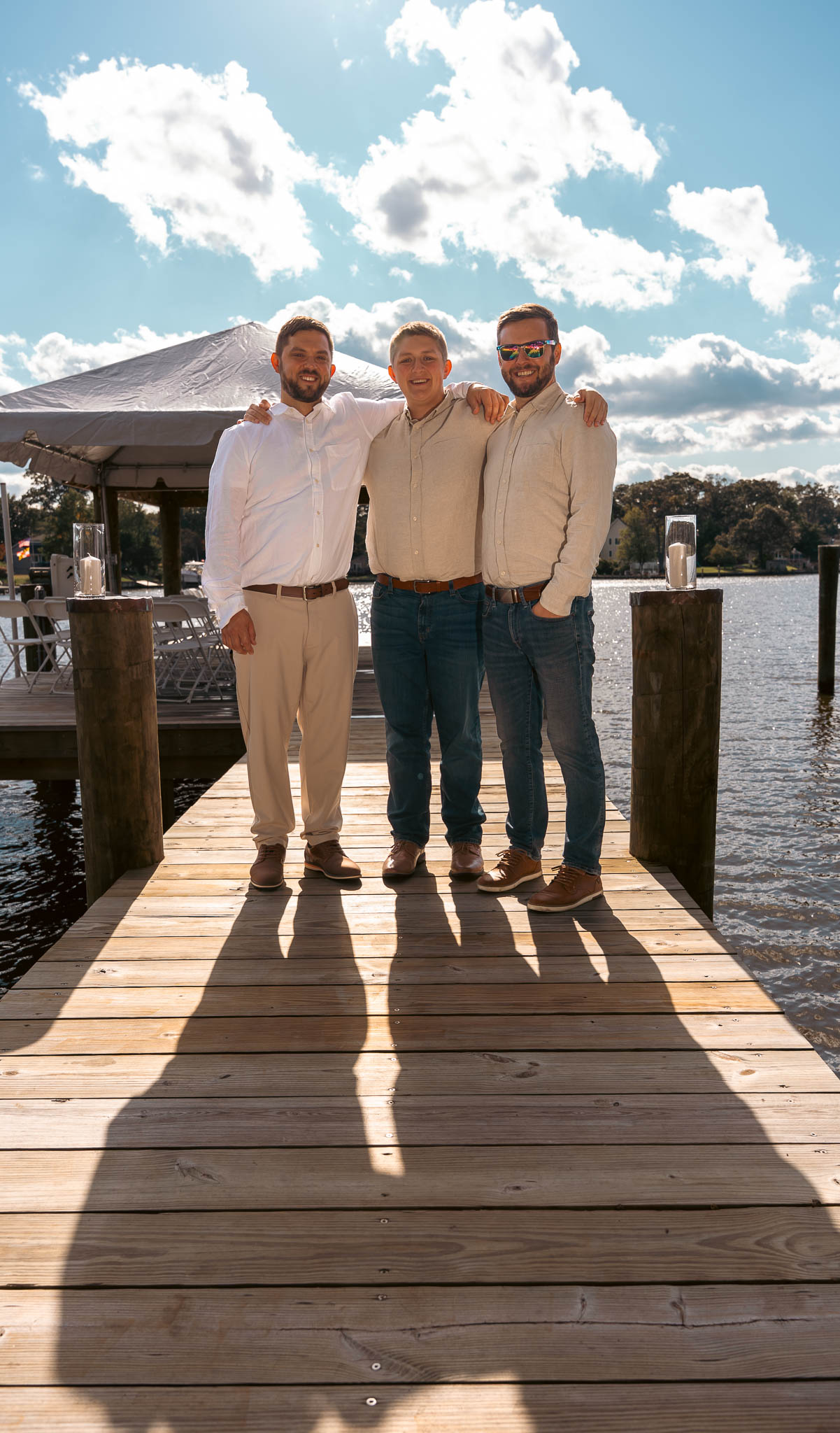 Groomsmen portrait on the dock over the creek — backyard wedding in Annapolis, Maryland