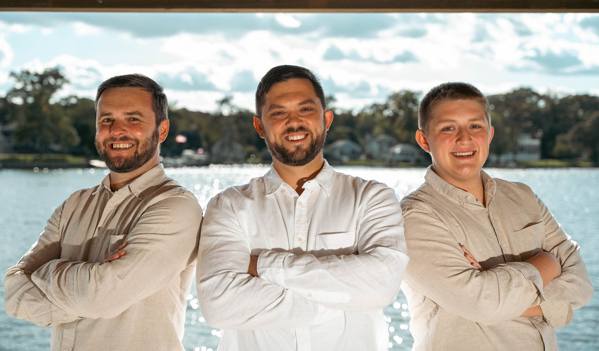 Groom and groomsmen on the dock before the ceremony — backyard wedding in Annapolis, Maryland
