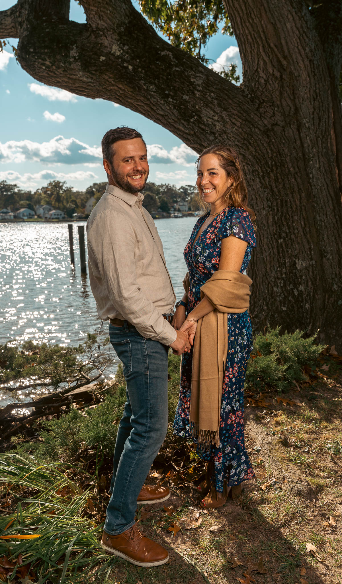 Relatives photographed by the creek before the wedding — backyard wedding in Annapolis, Maryland