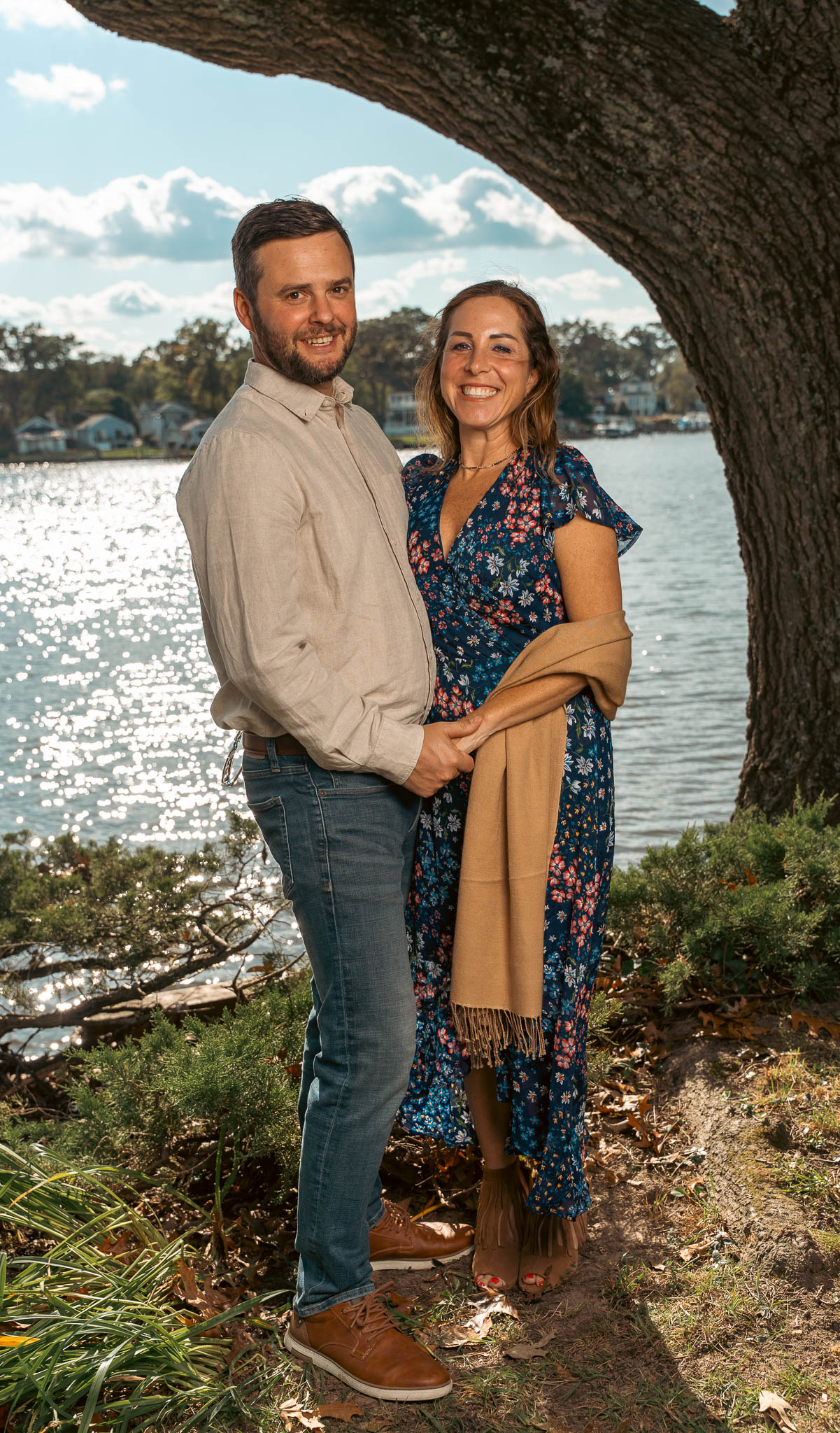 Relatives photographed by the creek before the wedding — backyard wedding in Annapolis, Maryland