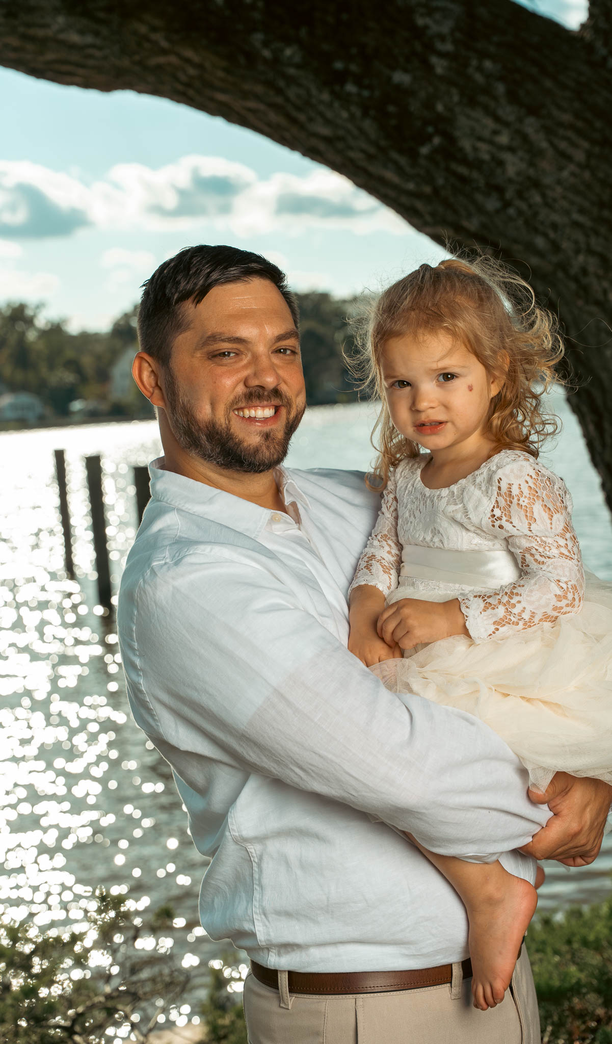 Family portraits under the oak at the water's edge — backyard wedding in Annapolis, Maryland
