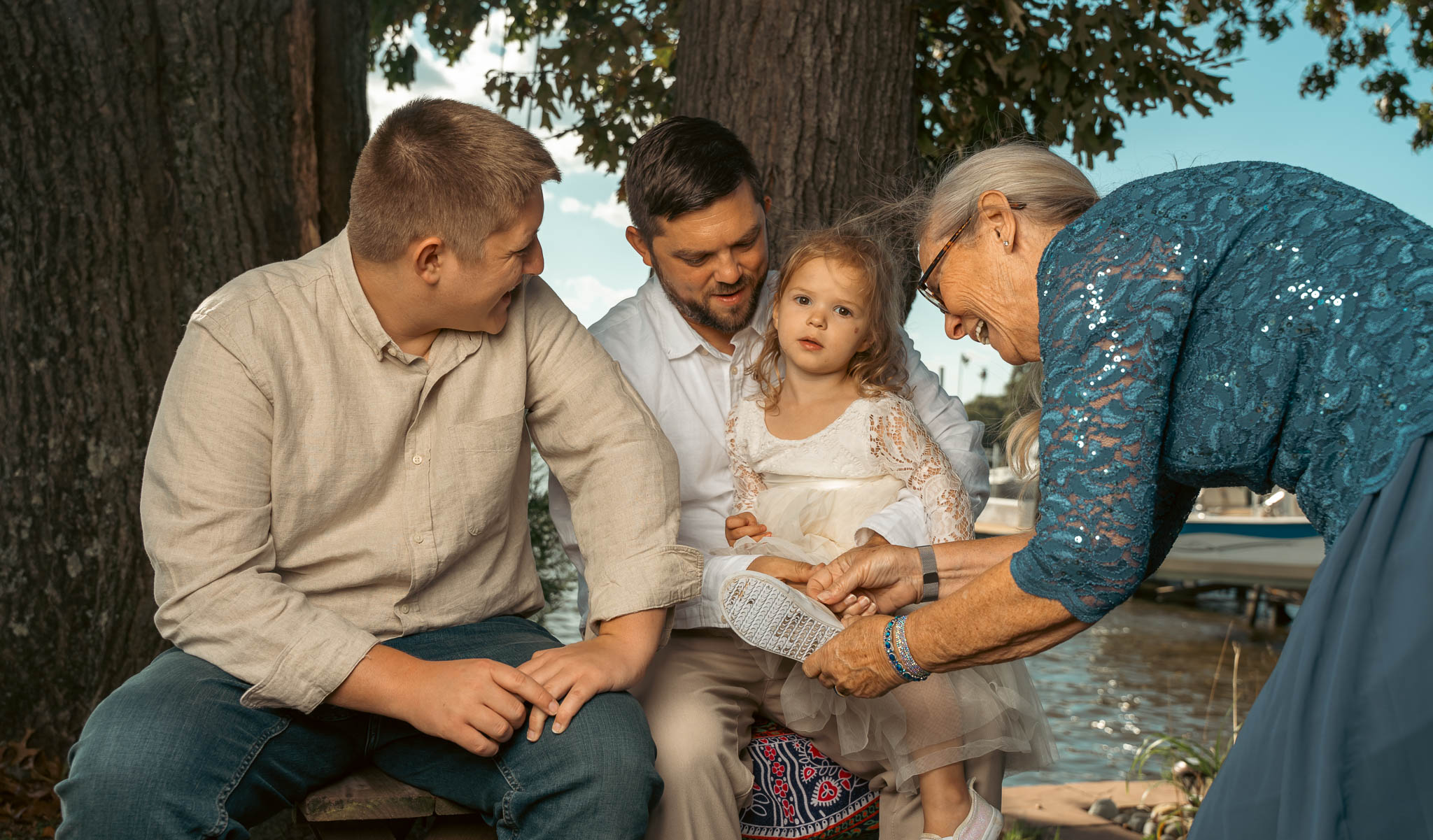 Relatives photographed by the creek before the wedding — backyard wedding in Annapolis, Maryland