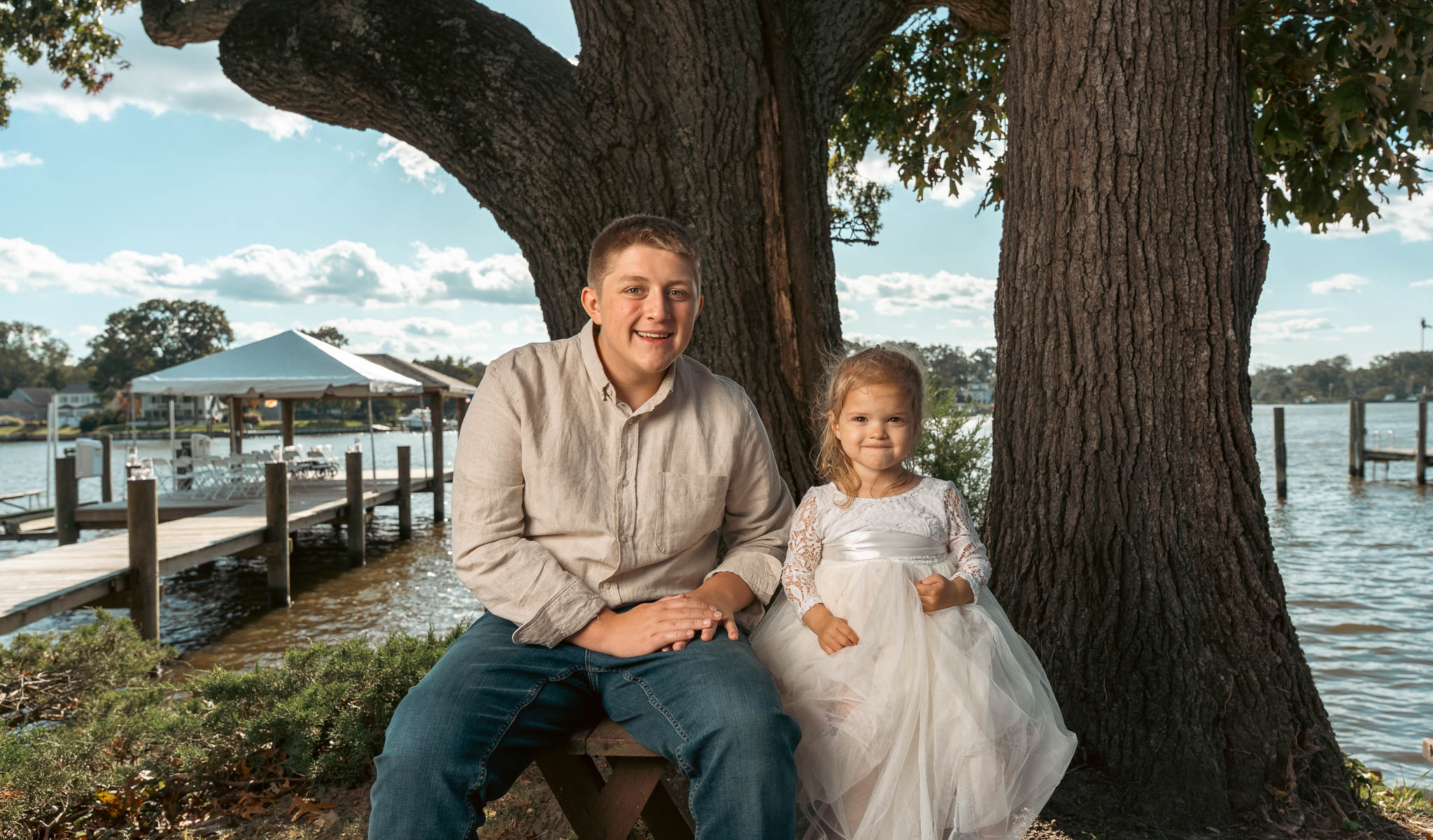 Family portrait by the water before the ceremony — backyard wedding in Annapolis, Maryland