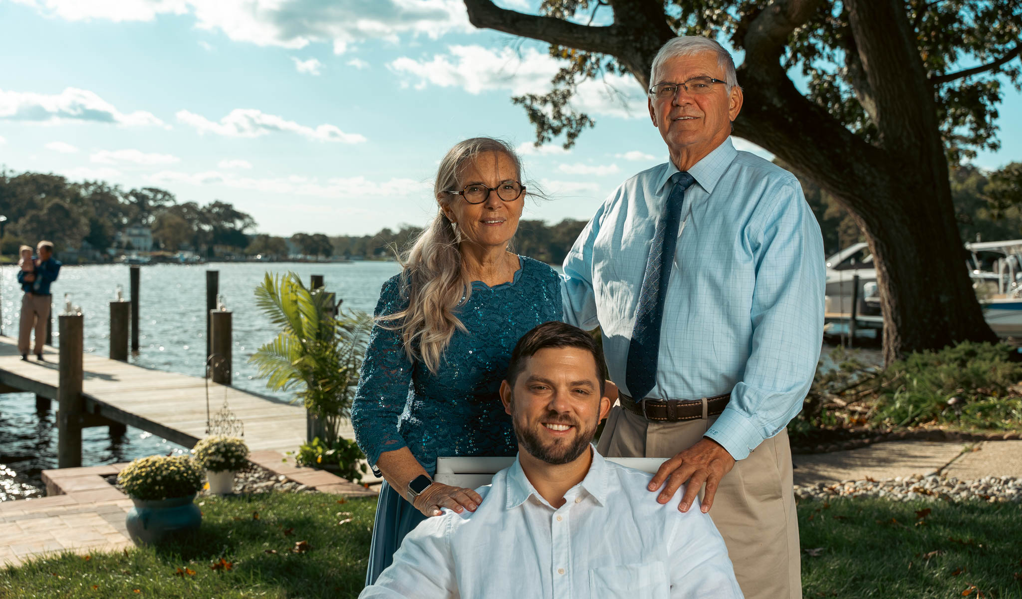 Family portraits under the oak at the water's edge — backyard wedding in Annapolis, Maryland