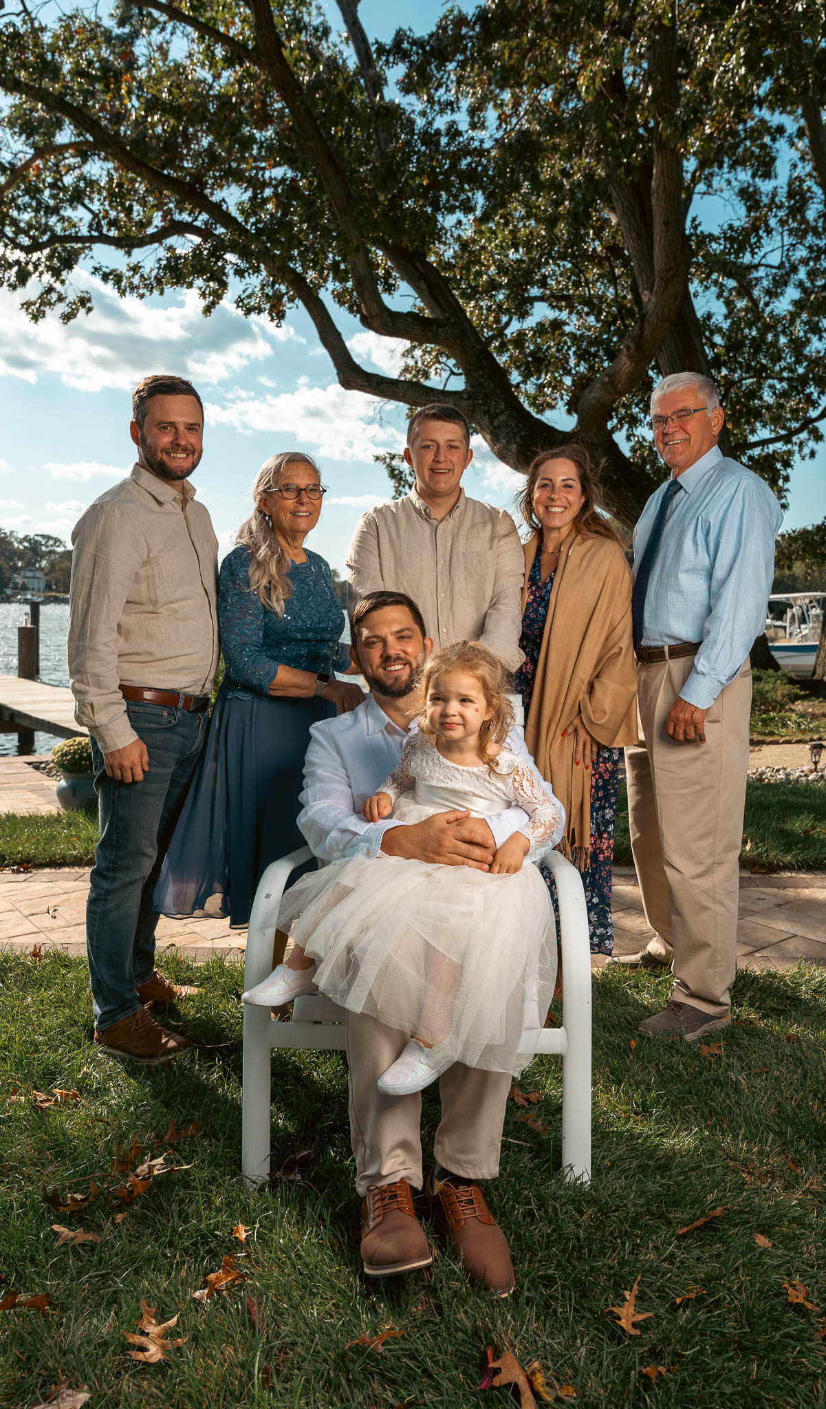Family portraits under the oak at the water's edge — backyard wedding in Annapolis, Maryland