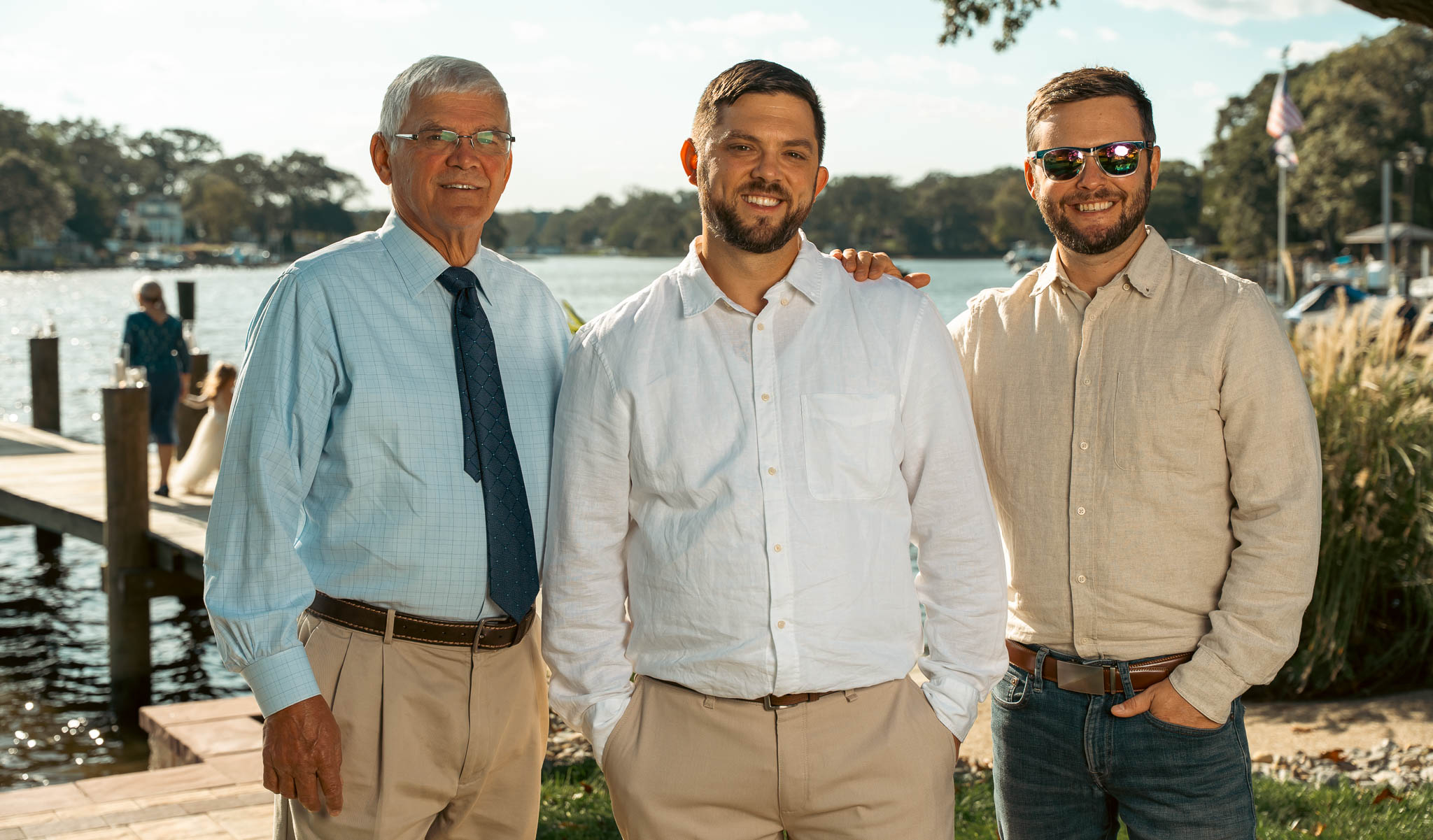 Family portrait by the water before the ceremony — backyard wedding in Annapolis, Maryland
