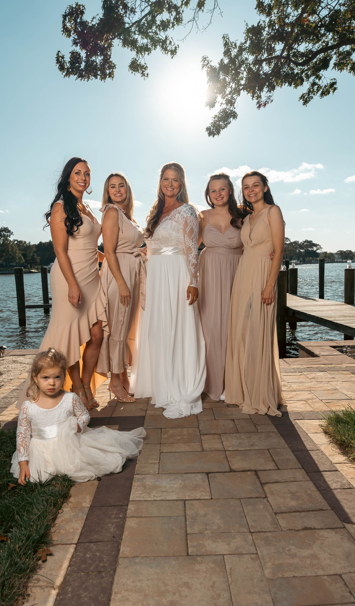 Bridesmaids on the waterfront before the ceremony — backyard wedding in Annapolis, Maryland