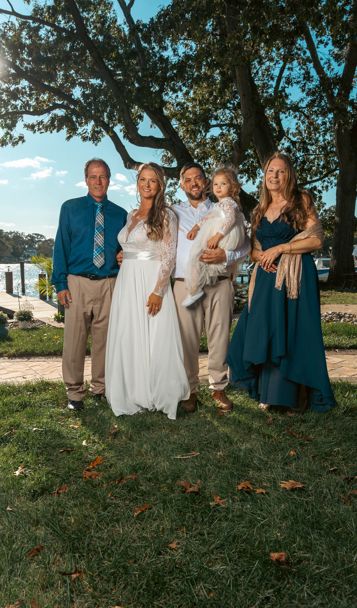 Family formal portrait under the oak by the water — backyard wedding in Annapolis, Maryland