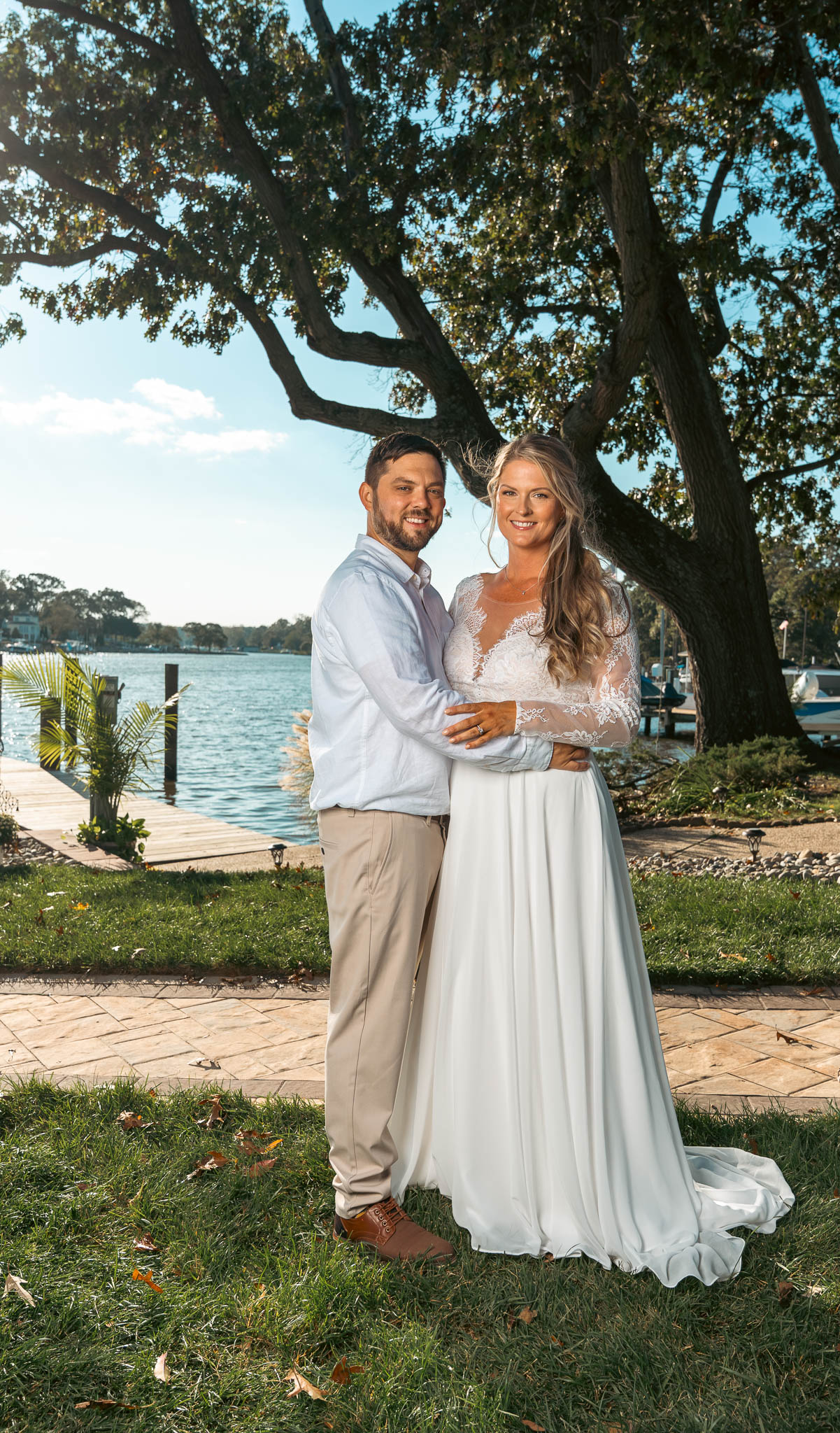 Relatives posed at the water's edge — backyard wedding in Annapolis, Maryland