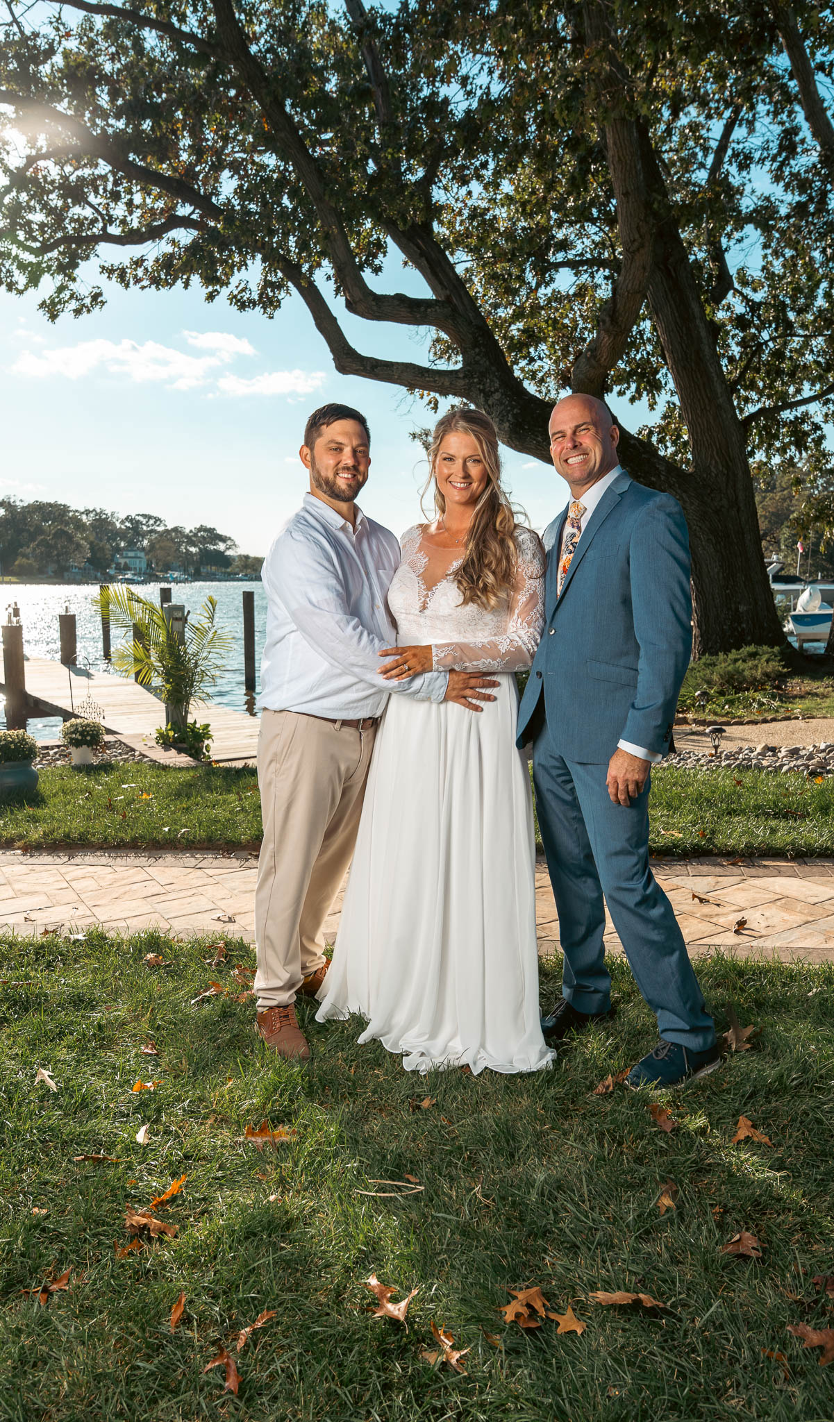 Family photographed together before the ceremony — backyard wedding in Annapolis, Maryland