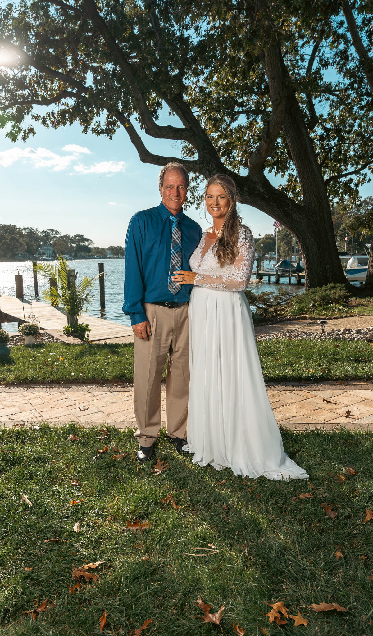 Relatives posed at the water's edge — backyard wedding in Annapolis, Maryland