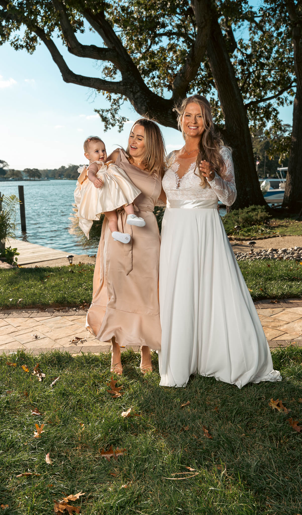 Family photographed together before the ceremony — backyard wedding in Annapolis, Maryland