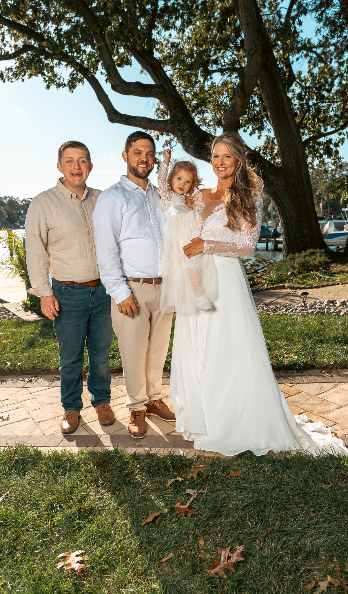 Family photographed together before the ceremony — backyard wedding in Annapolis, Maryland
