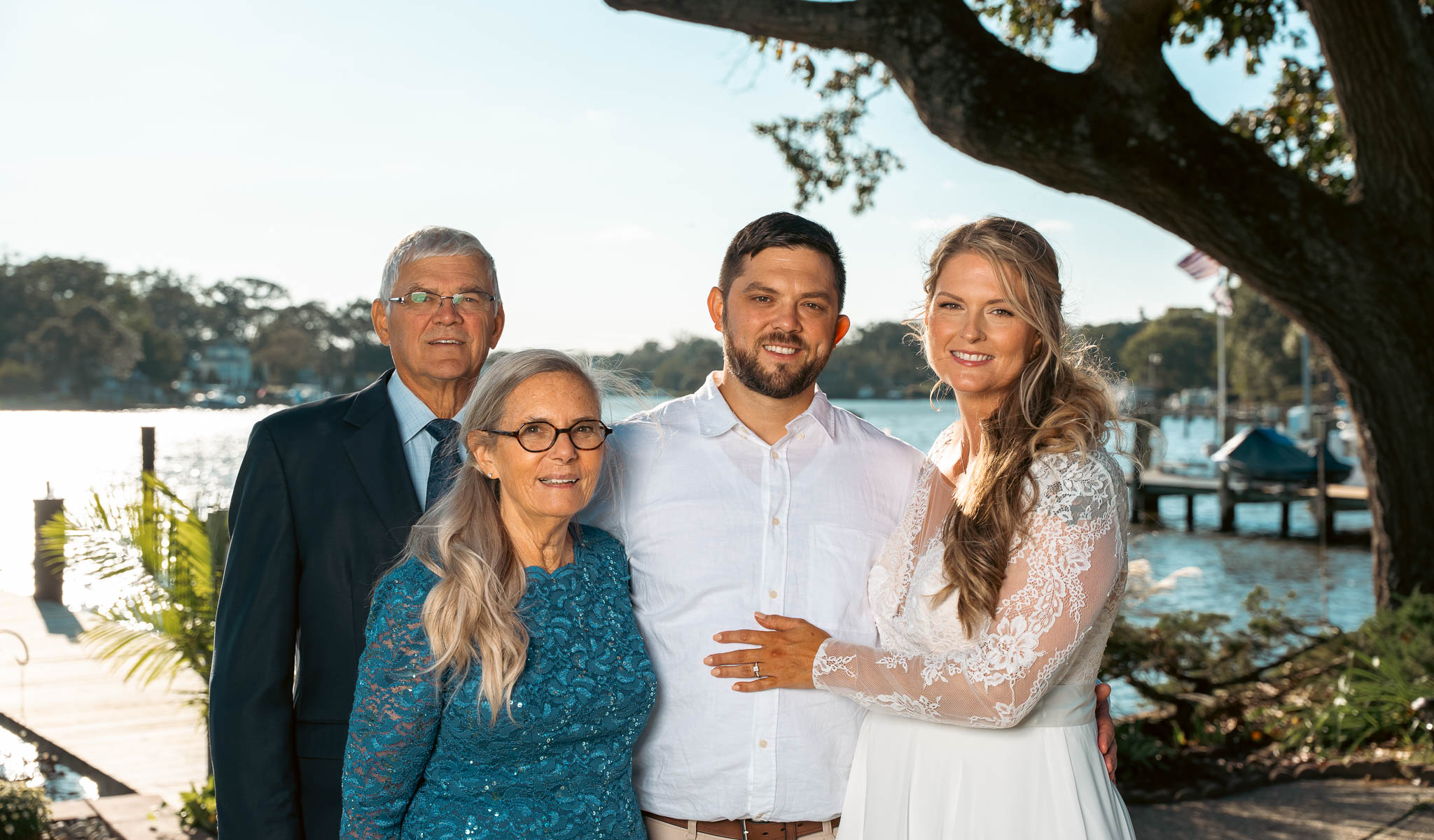 Family photographed together before the ceremony — backyard wedding in Annapolis, Maryland