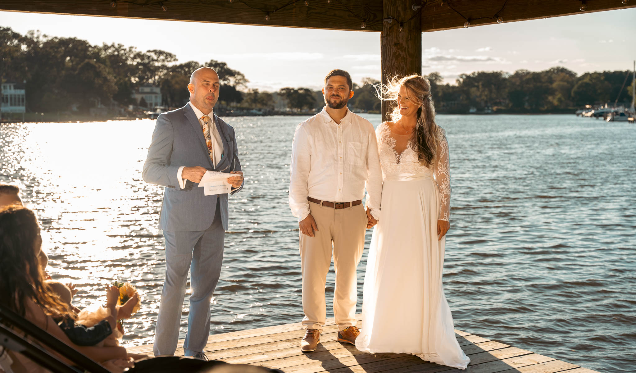 Vows on the dock with the creek on three sides — backyard wedding in Annapolis, Maryland