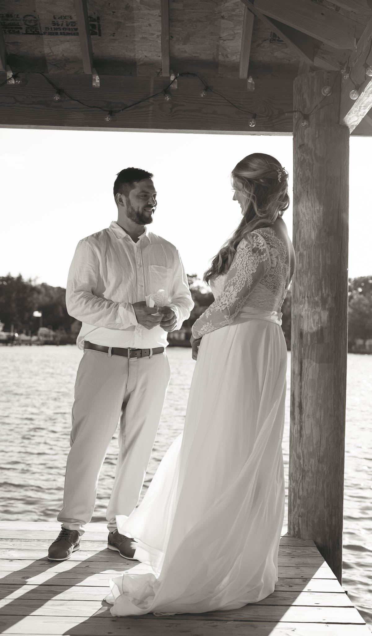 Vows on the dock with the creek on three sides — backyard wedding in Annapolis, Maryland