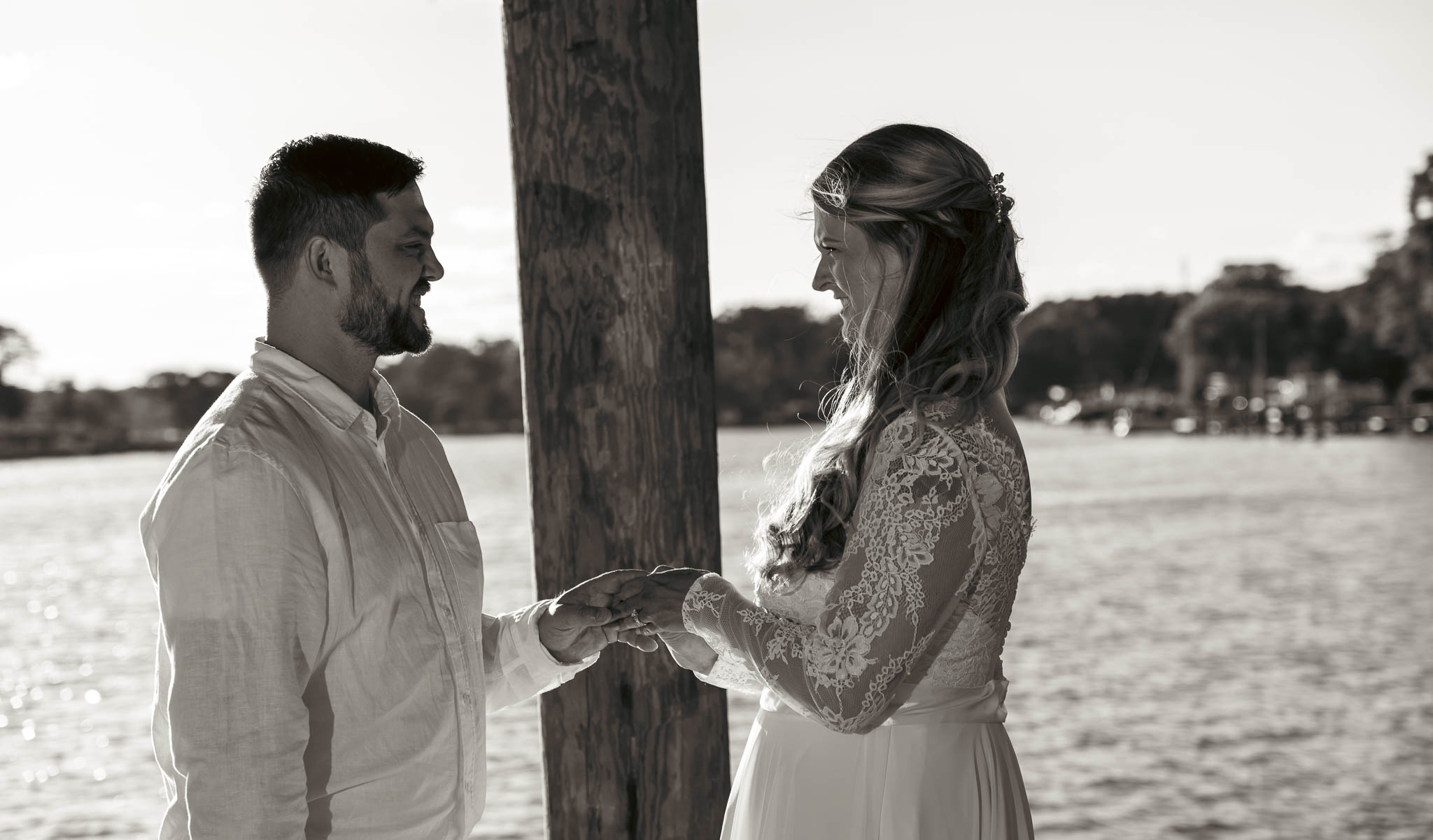 Wedding ceremony under the pavilion at the end of the dock — backyard wedding in Annapolis, Maryland