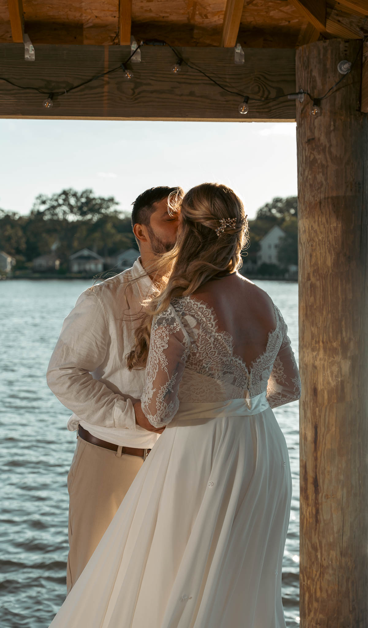 Vows on the dock with the creek on three sides — backyard wedding in Annapolis, Maryland