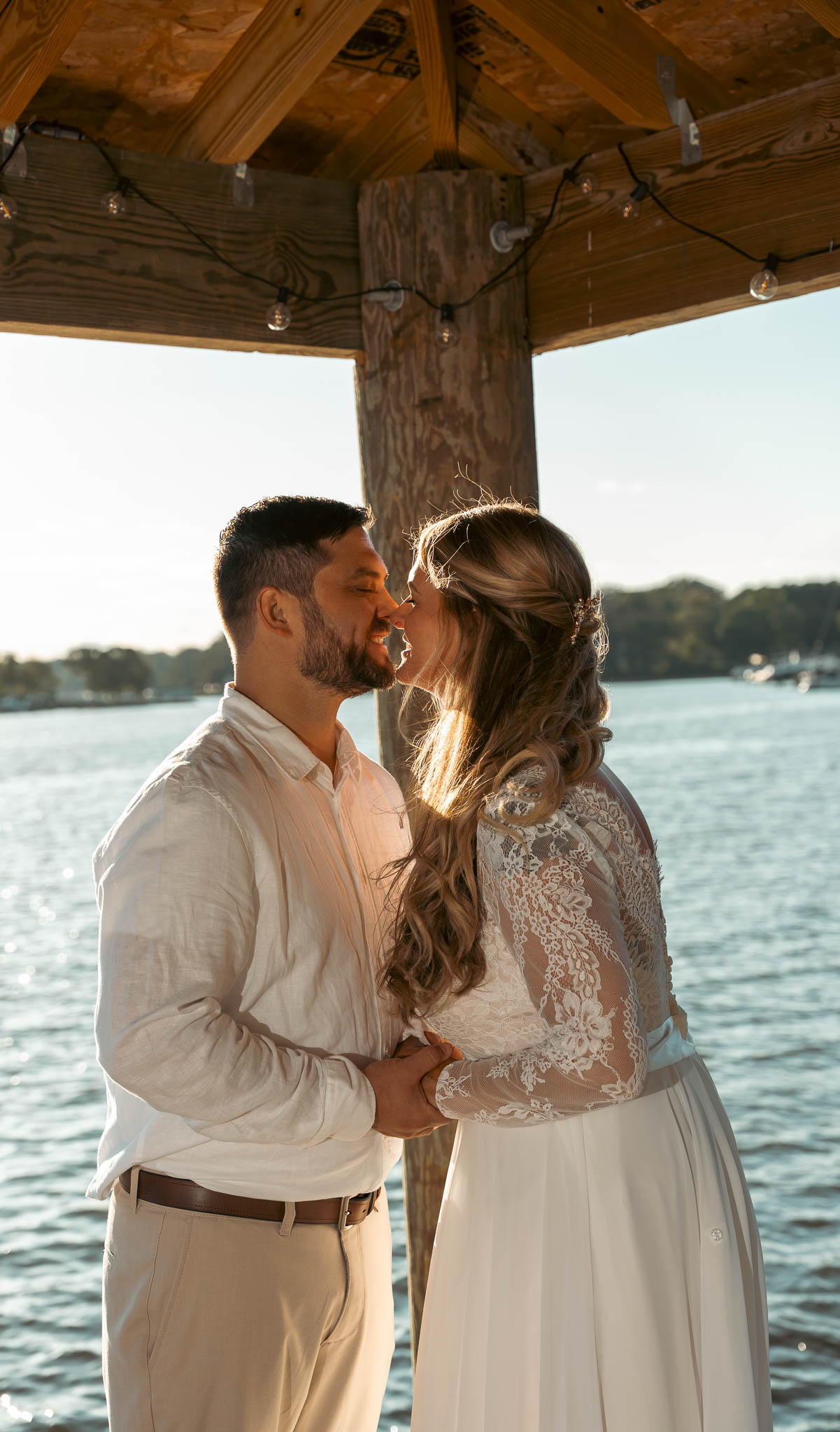 First moments as a married couple over the water — backyard wedding in Annapolis, Maryland