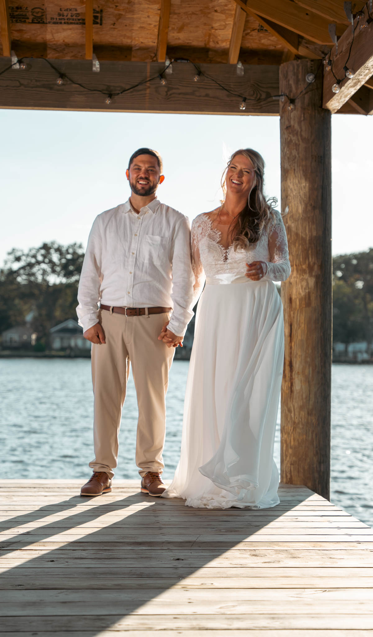 First moments as a married couple over the water — backyard wedding in Annapolis, Maryland