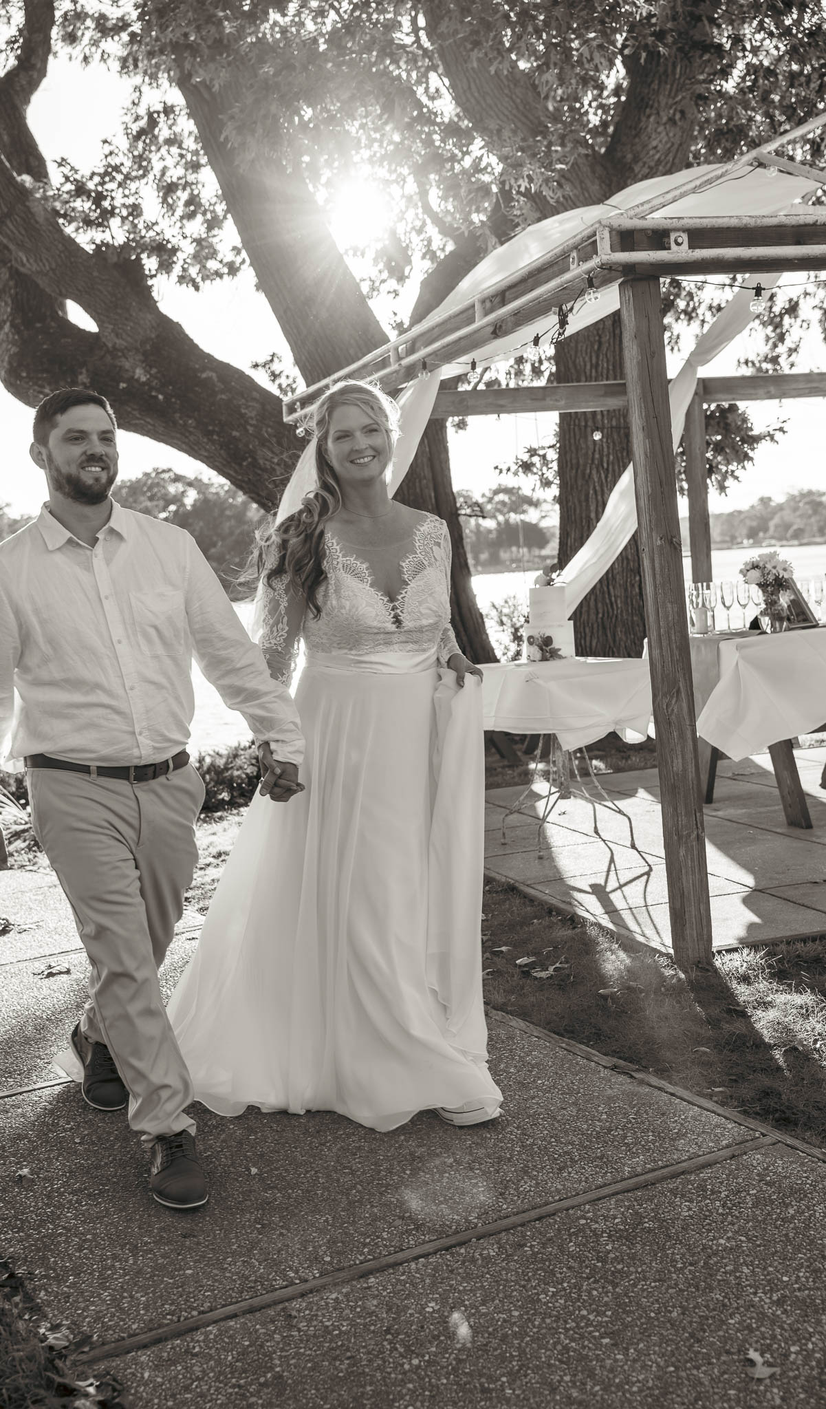 First moments as a married couple over the water — backyard wedding in Annapolis, Maryland