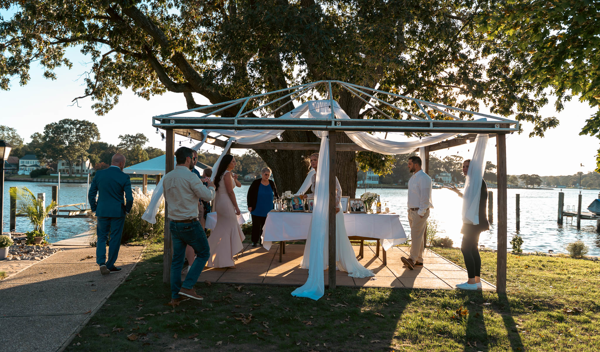 Guests congratulating the couple after the ceremony — backyard wedding in Annapolis, Maryland