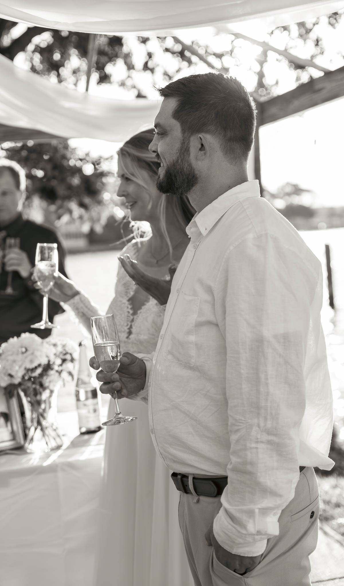 Toasting the newlyweds in the backyard — backyard wedding in Annapolis, Maryland