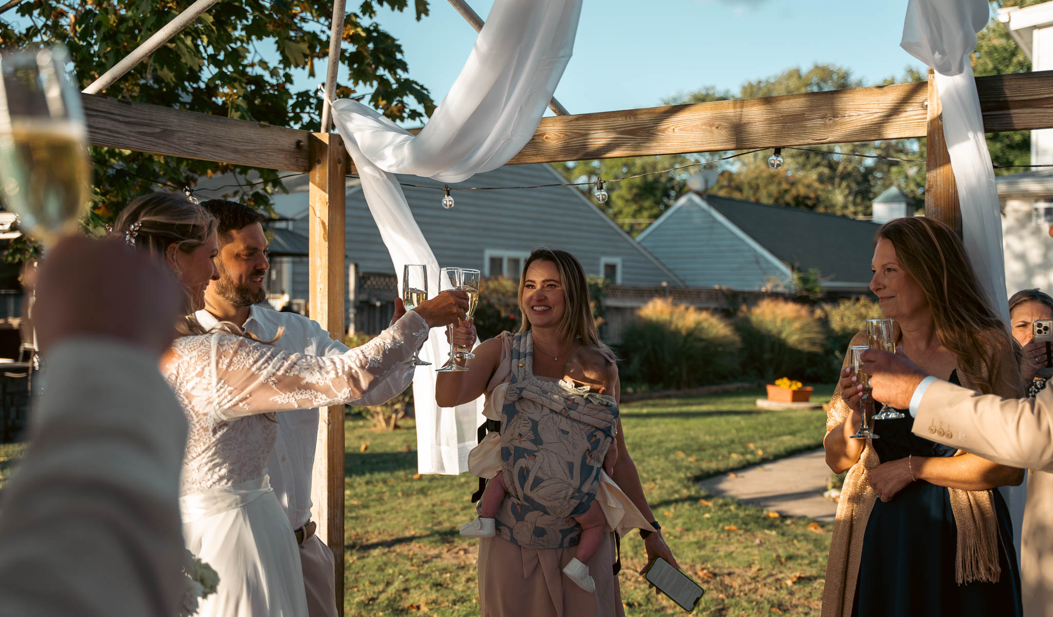 Guests gathered on the lawn after the vows — backyard wedding in Annapolis, Maryland