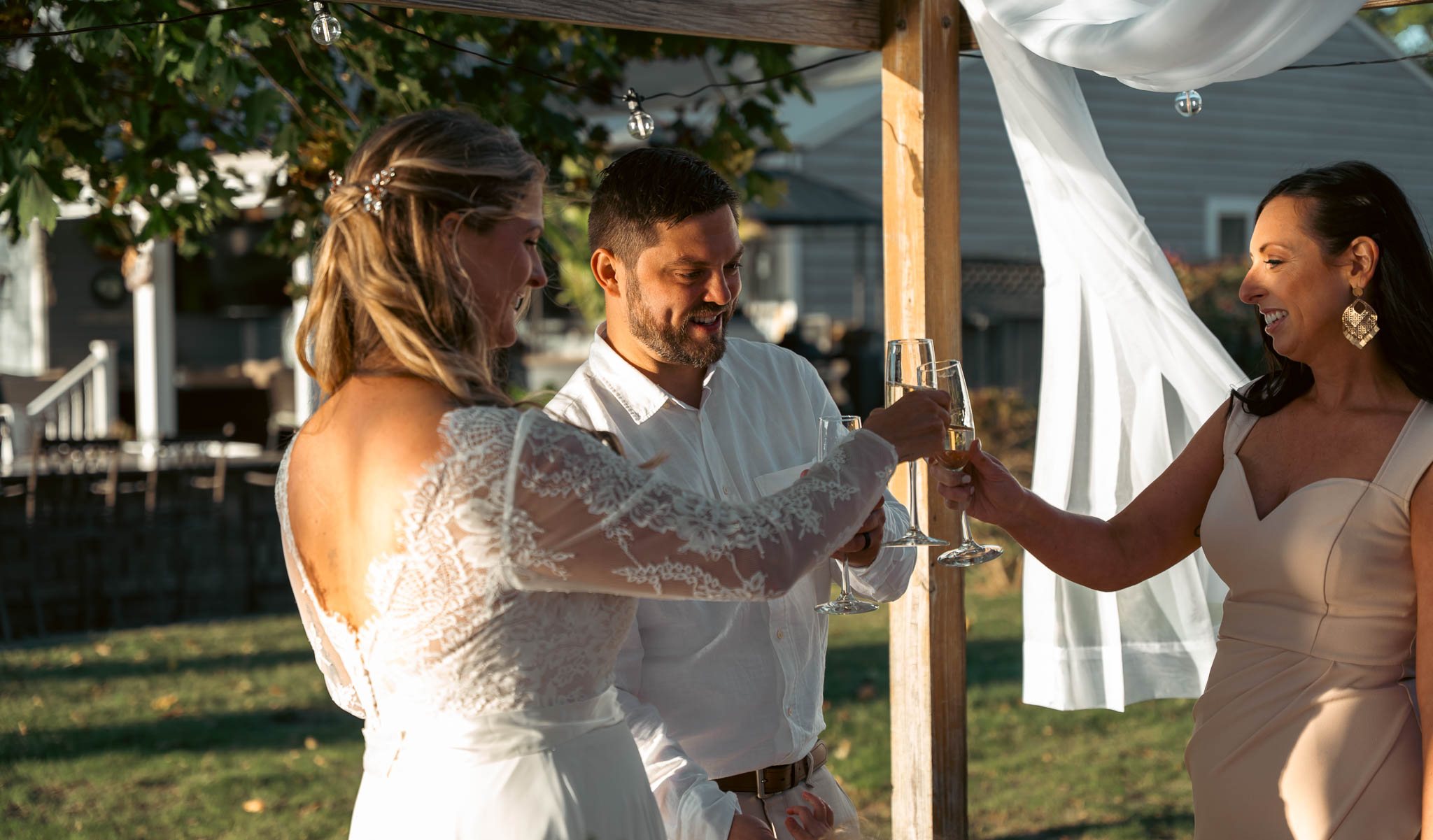 Guests congratulating the couple after the ceremony — backyard wedding in Annapolis, Maryland