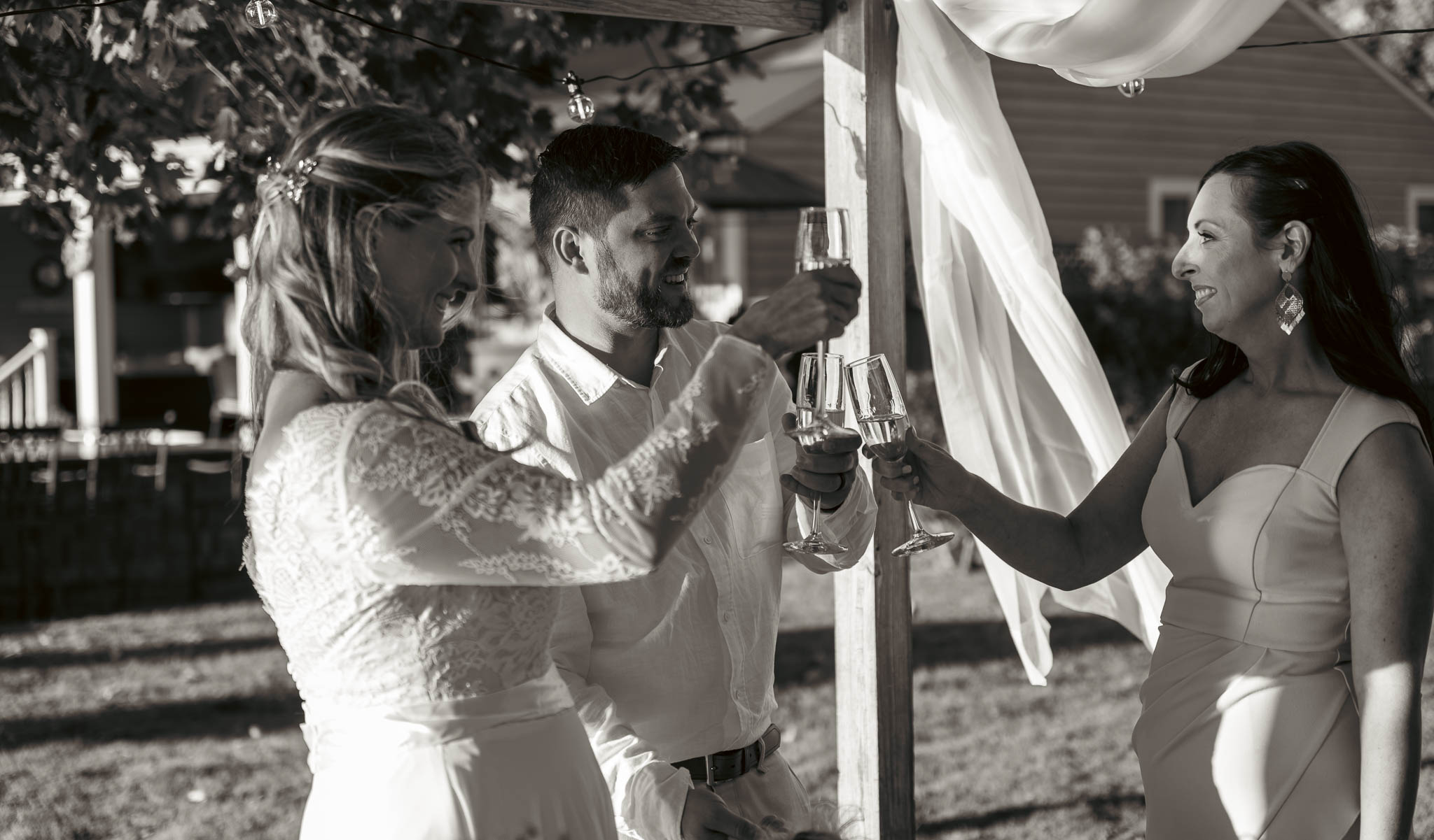 Hugs and congratulations in the backyard — backyard wedding in Annapolis, Maryland