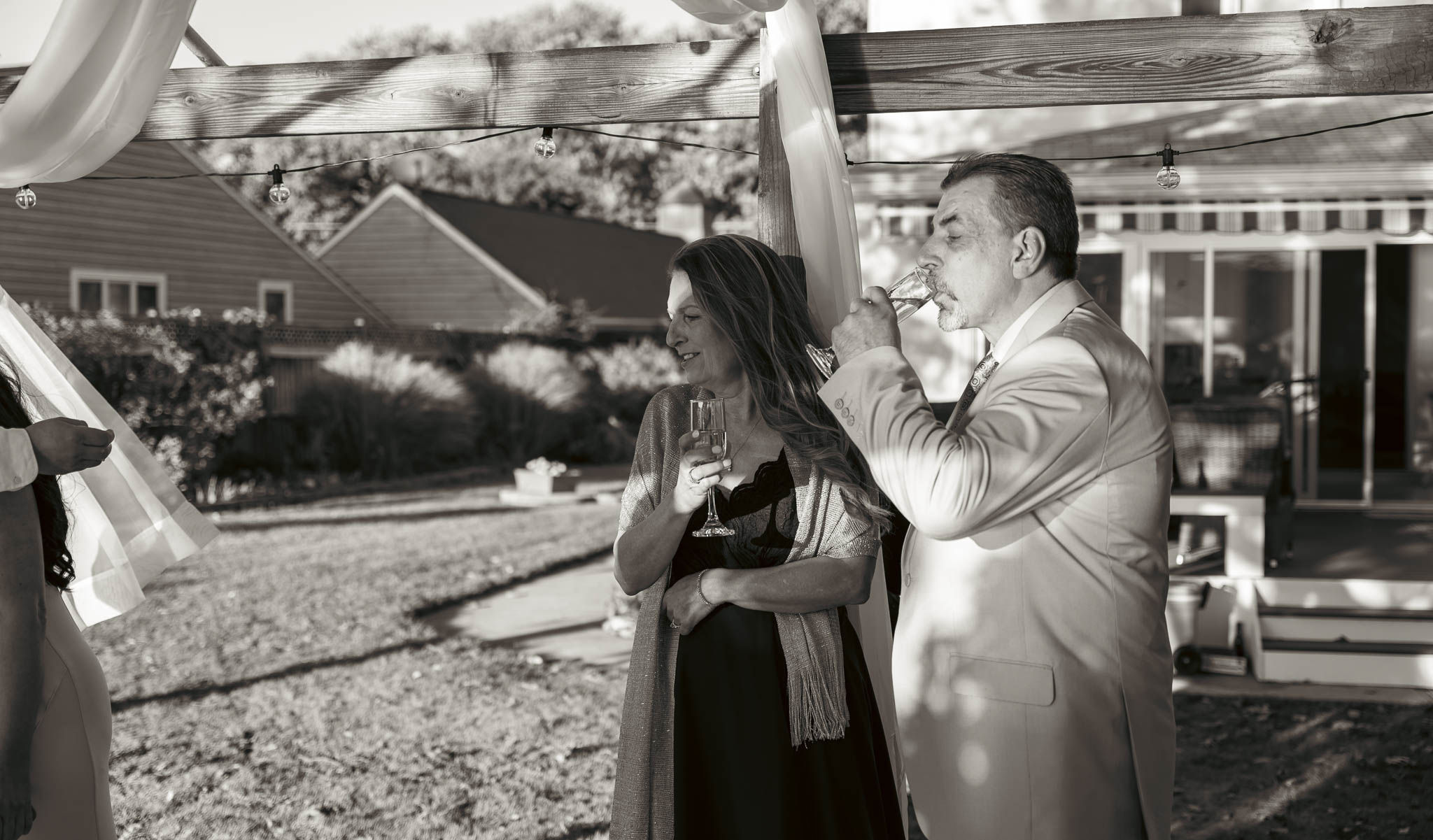 Family and friends celebrating after the ceremony — backyard wedding in Annapolis, Maryland