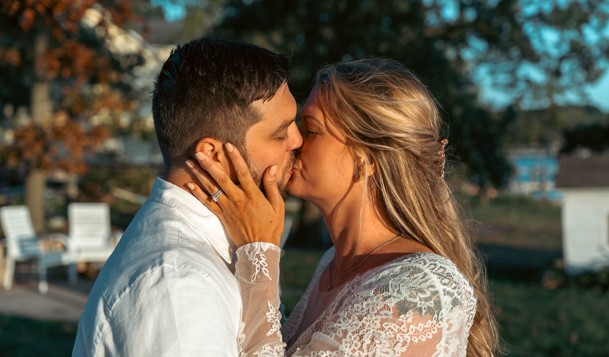 Rings and hands photographed in the golden light — backyard wedding in Annapolis, Maryland