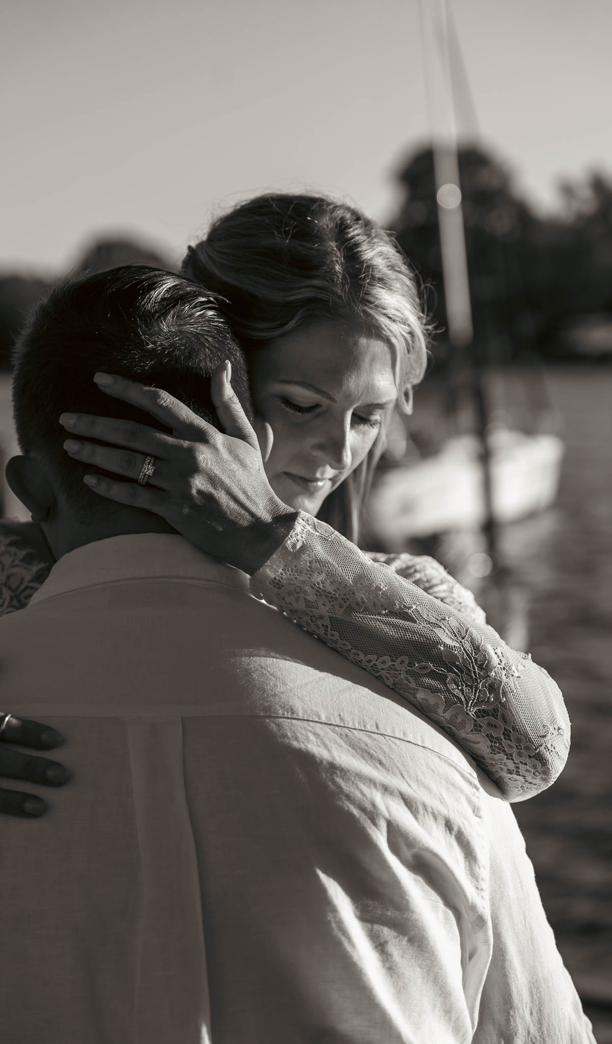 Rings and hands photographed in the golden light — backyard wedding in Annapolis, Maryland