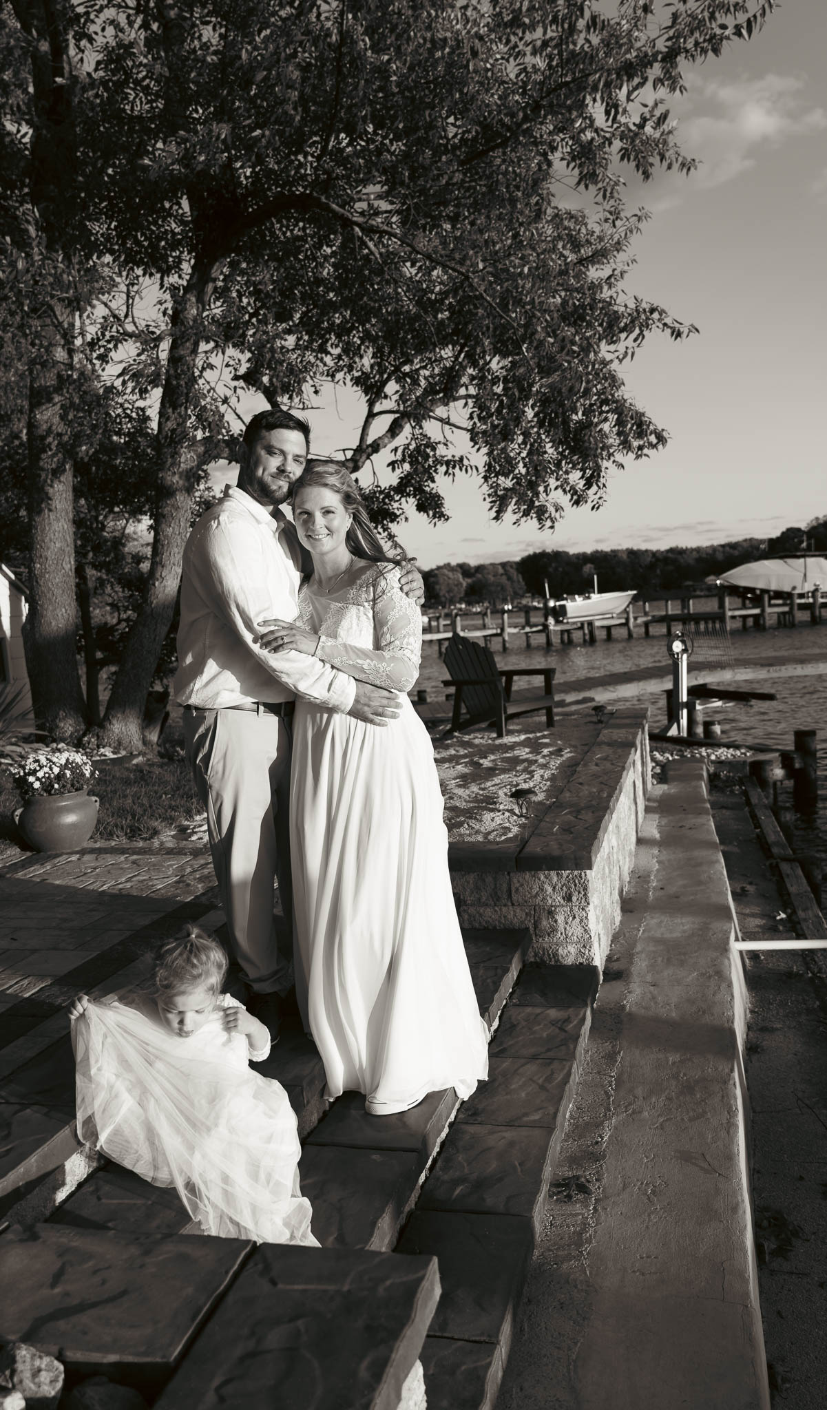 The couple in the evening light beside the water — backyard wedding in Annapolis, Maryland