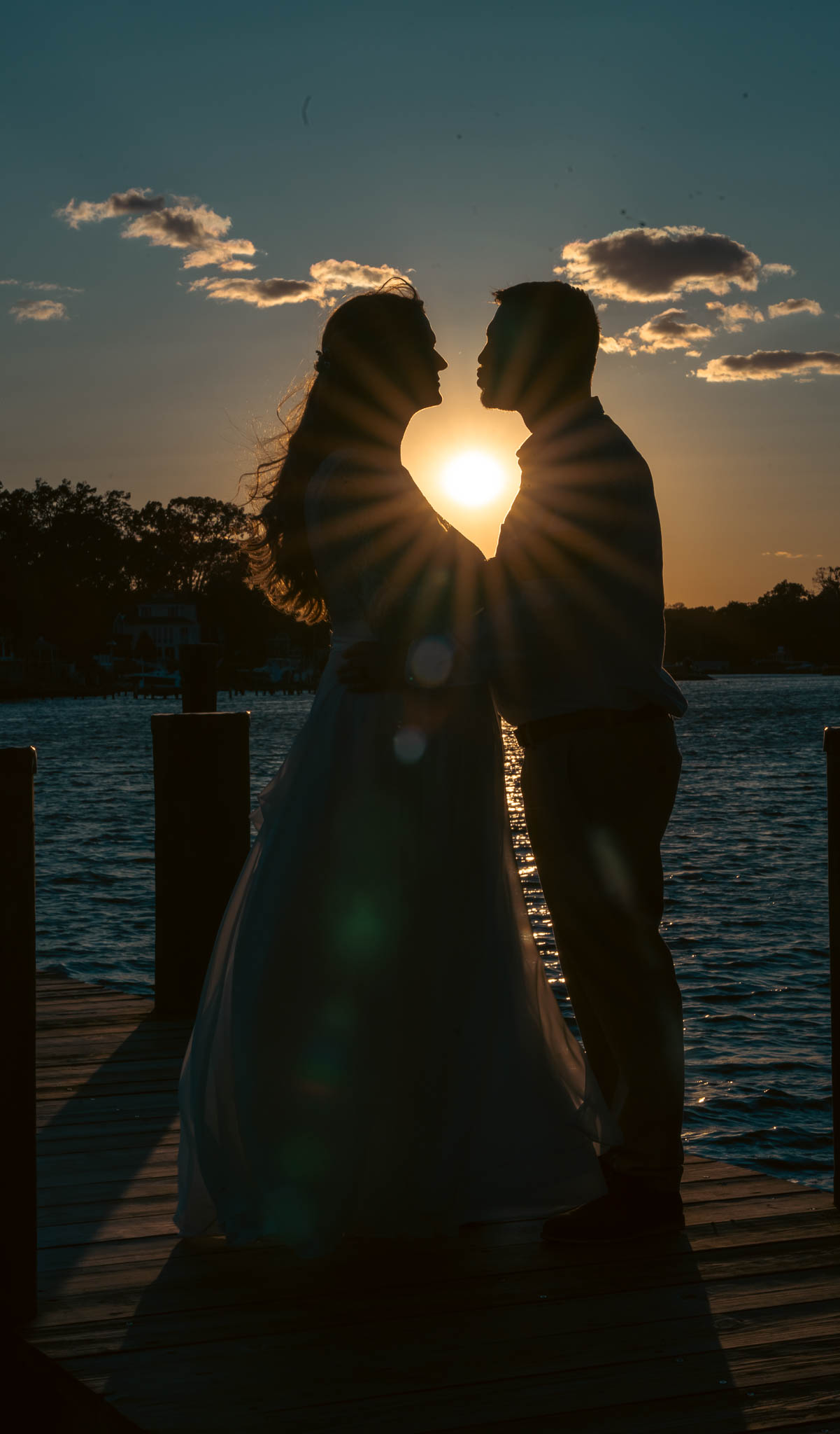Backlit portrait on the dock at sunset — backyard wedding in Annapolis, Maryland