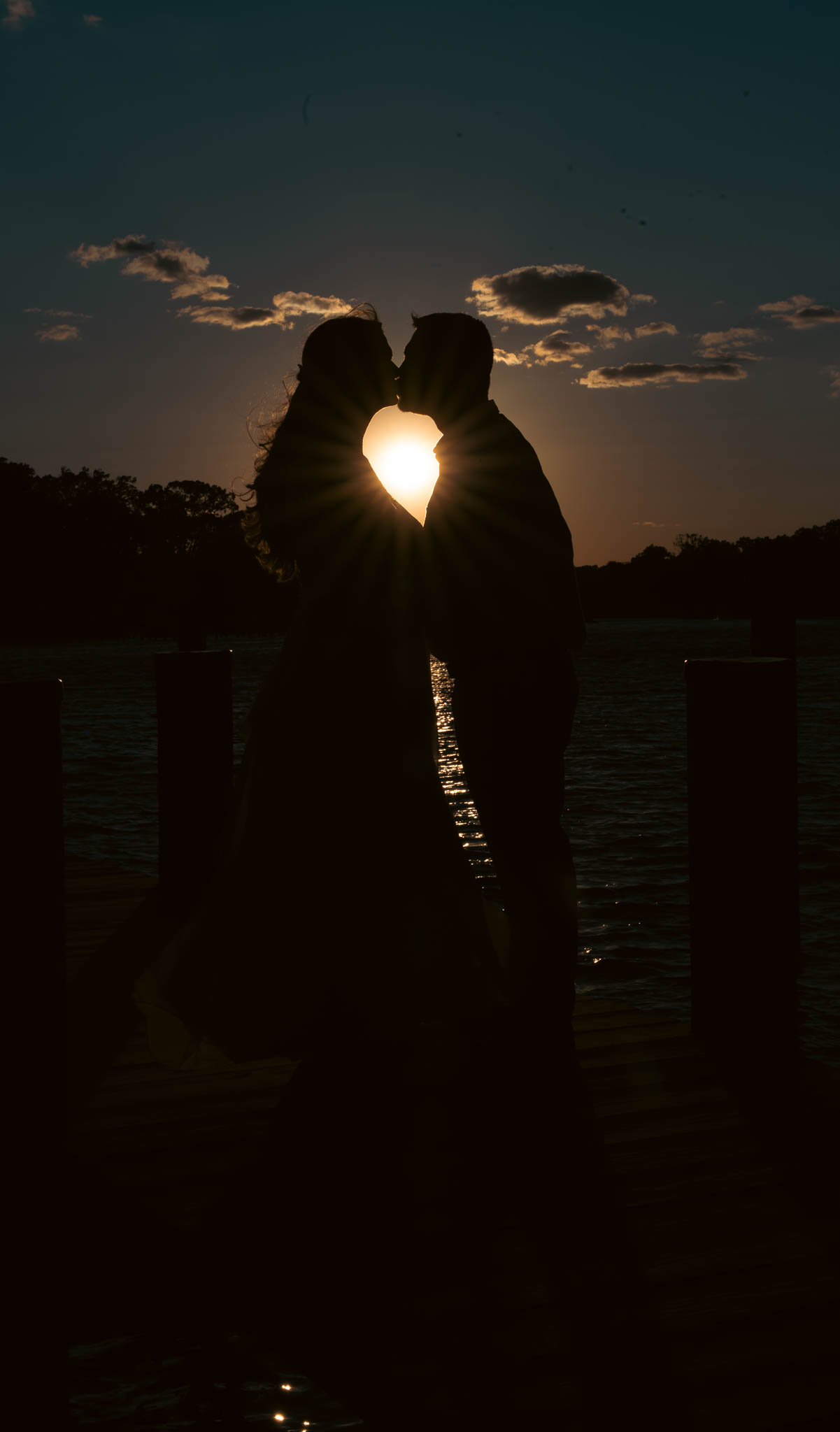 Sunset silhouette on the dock at the end of the day — backyard wedding in Annapolis, Maryland