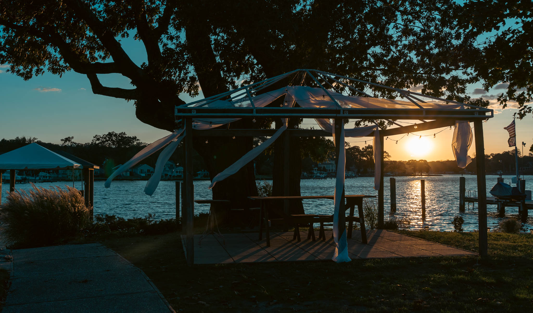 Backlit portrait on the dock at sunset — backyard wedding in Annapolis, Maryland