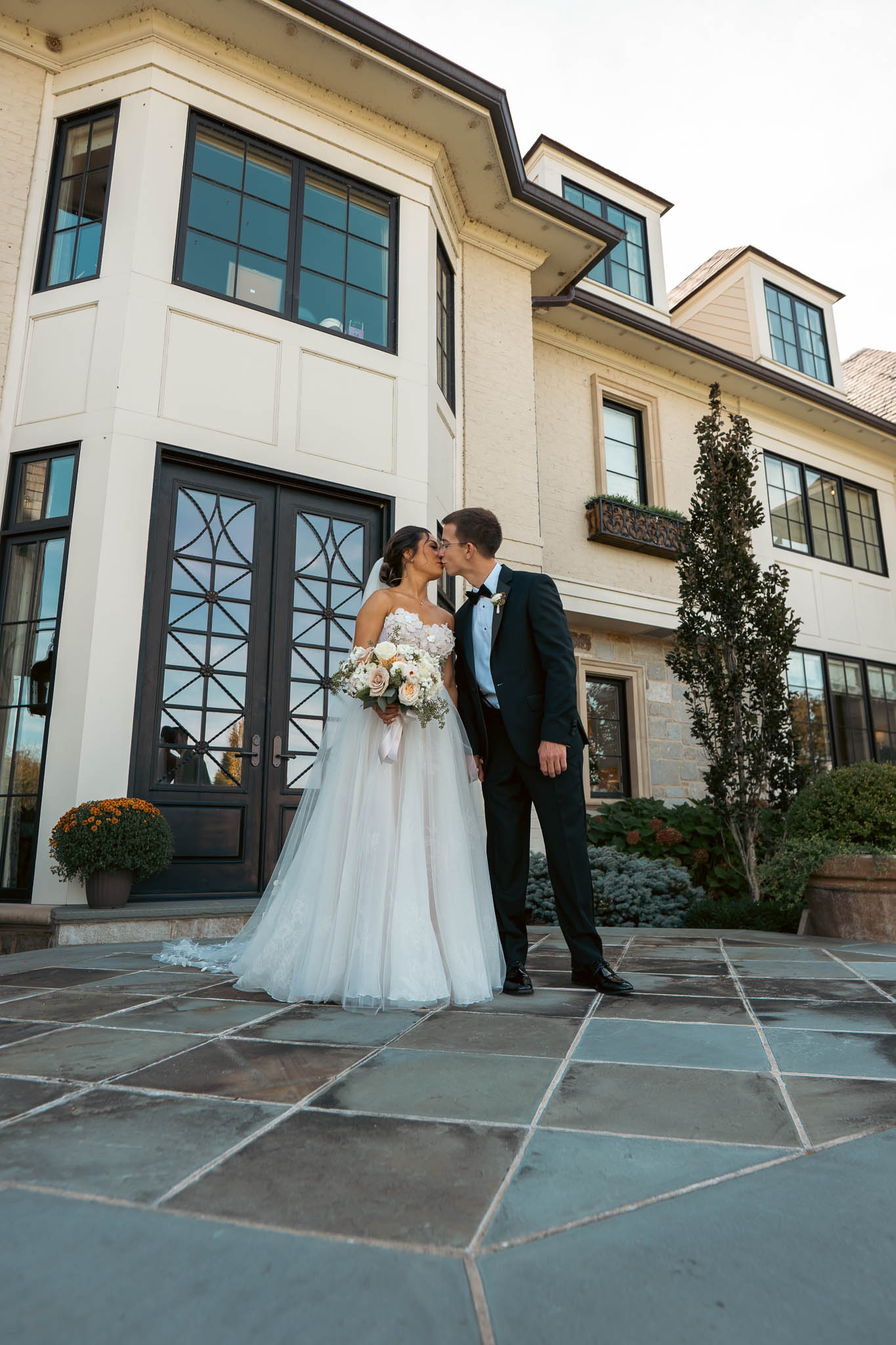 First look on the lawn outside the manor house — Sylvanside Farm wedding in Purcellville, Virginia