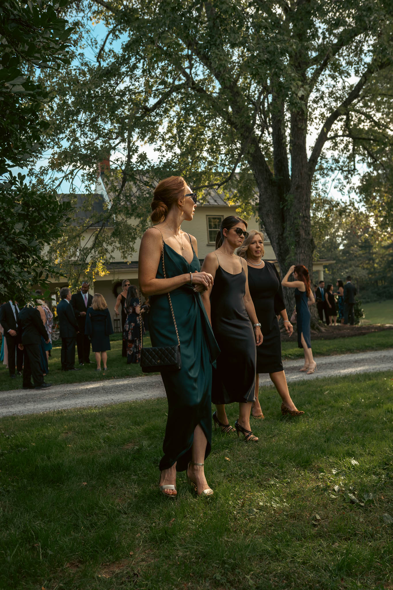 Wedding guests greeting each other before the ceremony — Sylvanside Farm wedding in Purcellville, Virginia