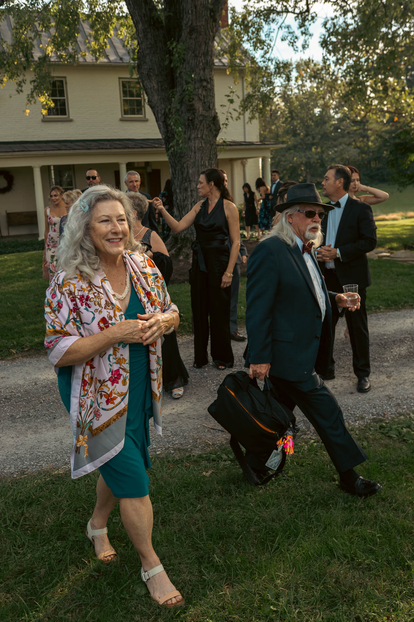 Wedding guests greeting each other before the ceremony — Sylvanside Farm wedding in Purcellville, Virginia