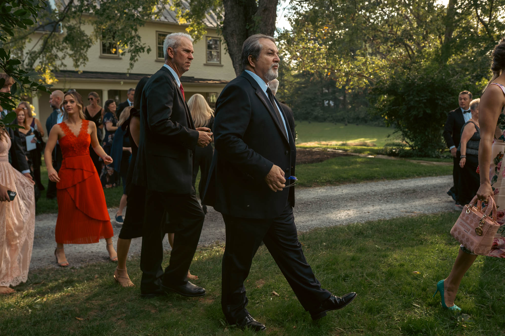 Guests arriving on the lawn before the ceremony — Sylvanside Farm wedding in Purcellville, Virginia