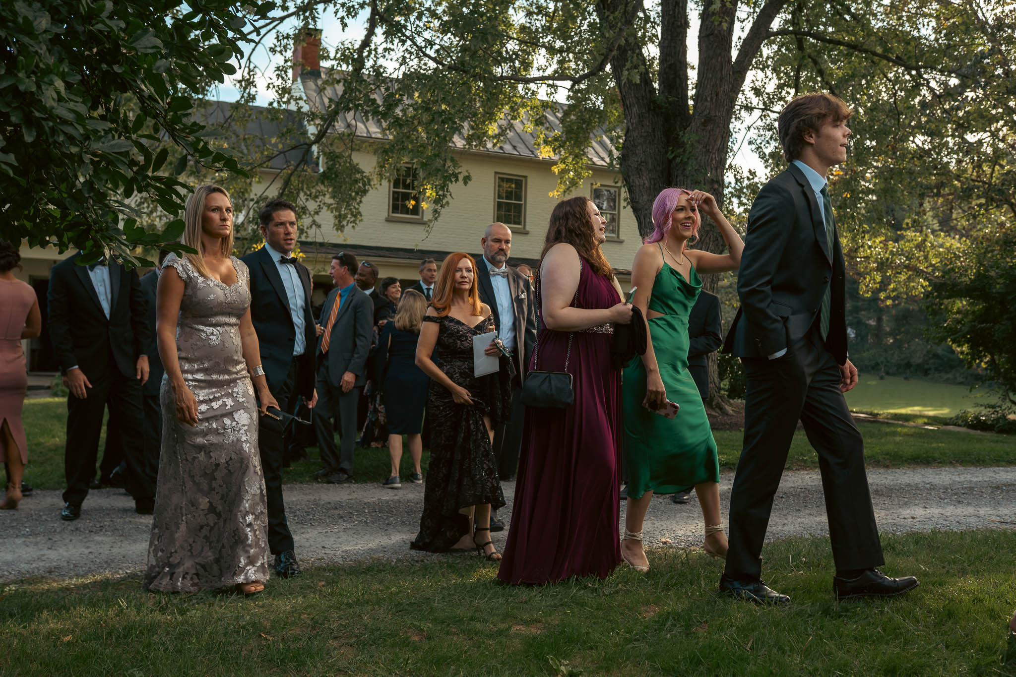 Guests gathering under the oaks before the ceremony — Sylvanside Farm wedding in Purcellville, Virginia