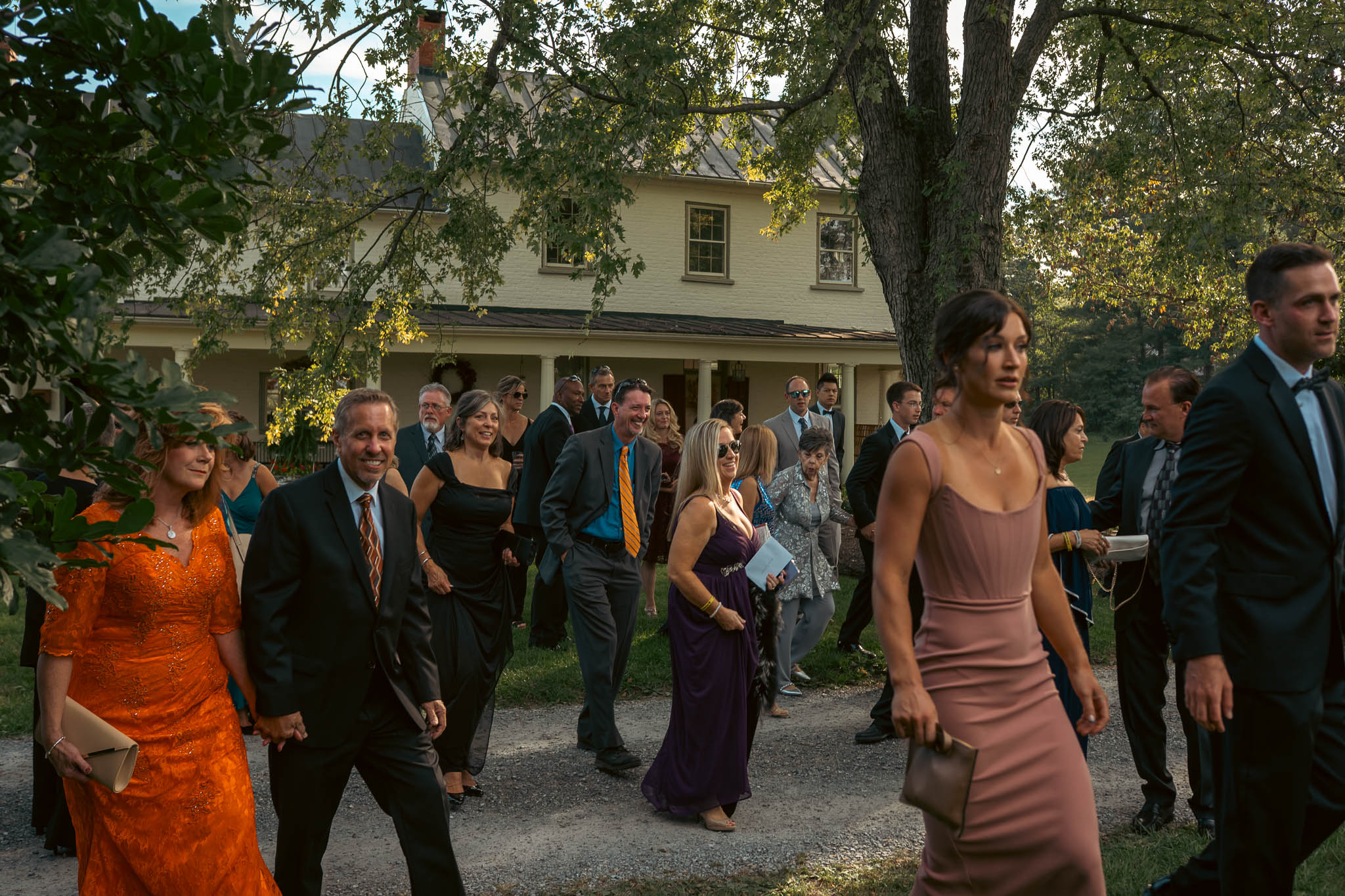 Wedding guests greeting each other before the ceremony — Sylvanside Farm wedding in Purcellville, Virginia