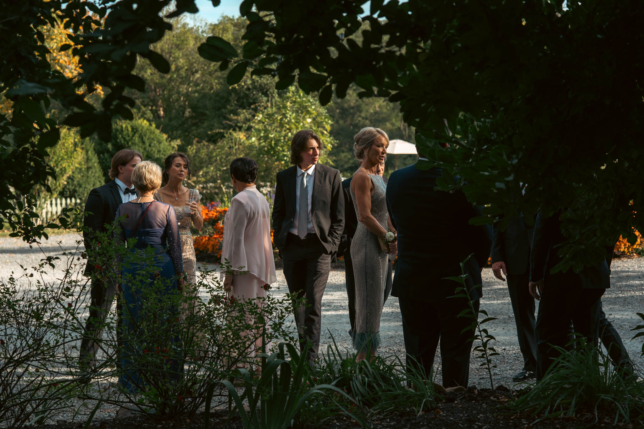 Wedding guests greeting each other before the ceremony — Sylvanside Farm wedding in Purcellville, Virginia