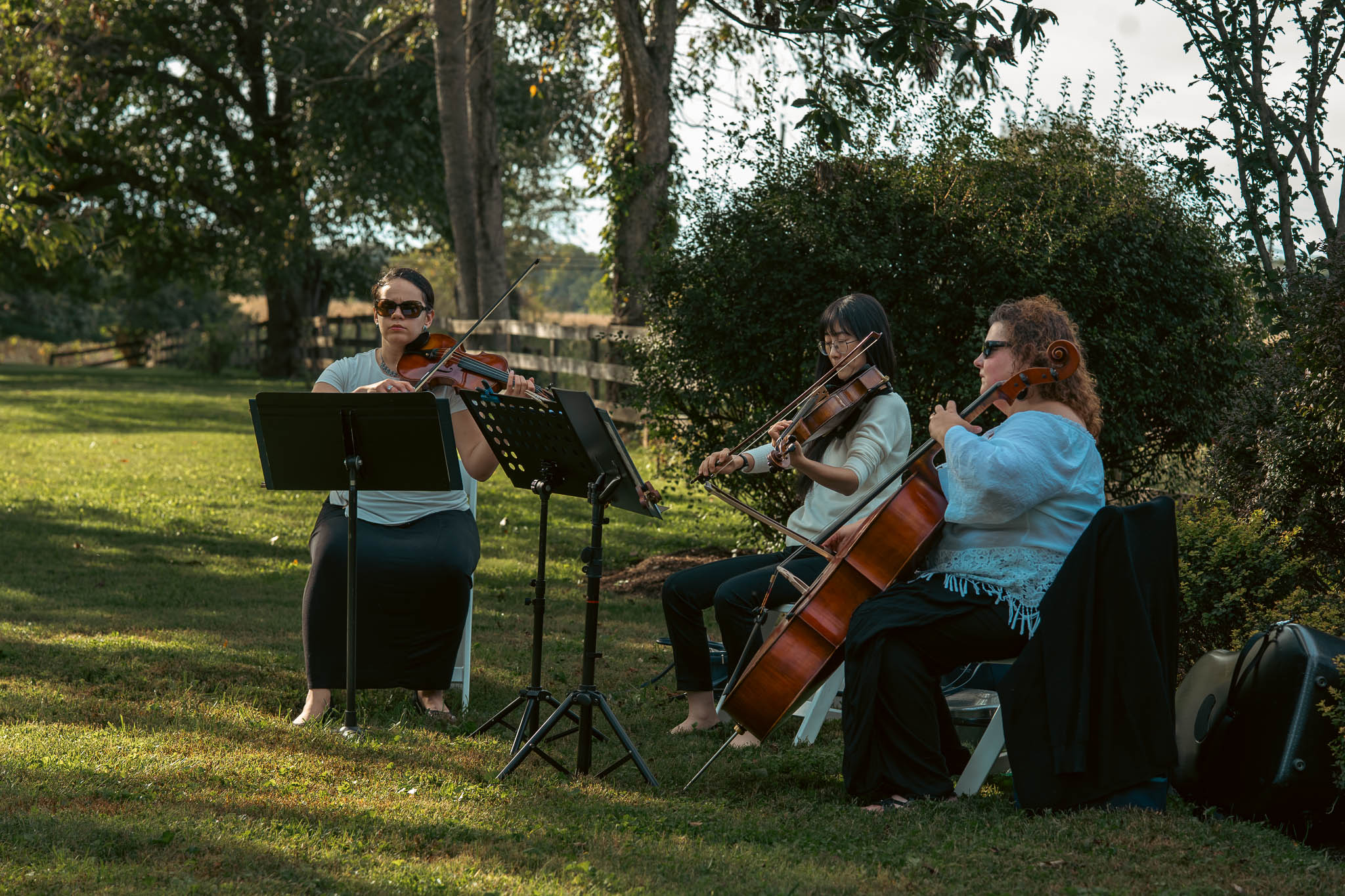 String quartet playing the ceremony prelude on the lawn — Sylvanside Farm wedding in Purcellville, Virginia