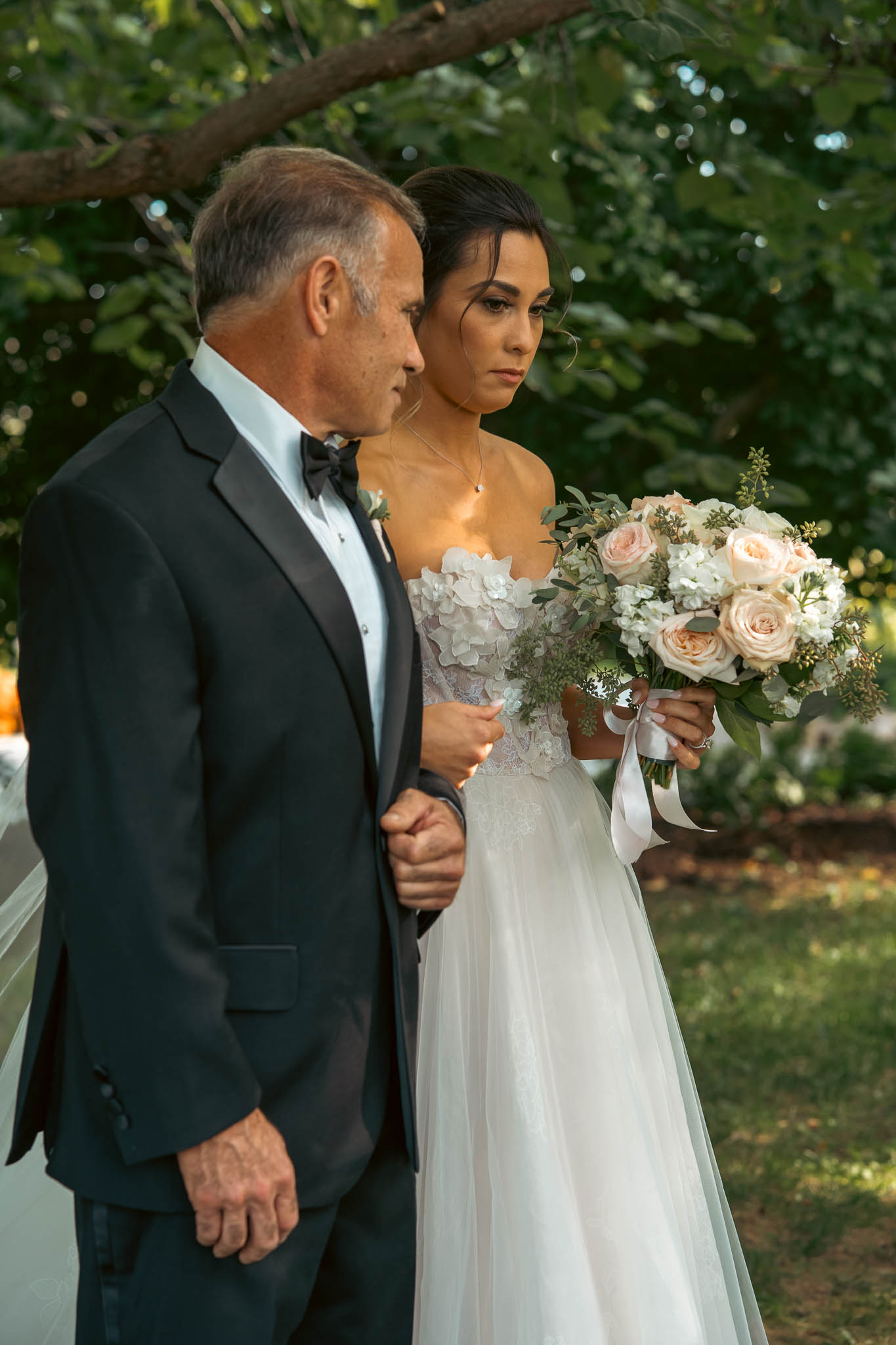 The bride on her father's arm before the processional — Sylvanside Farm wedding in Purcellville, Virginia