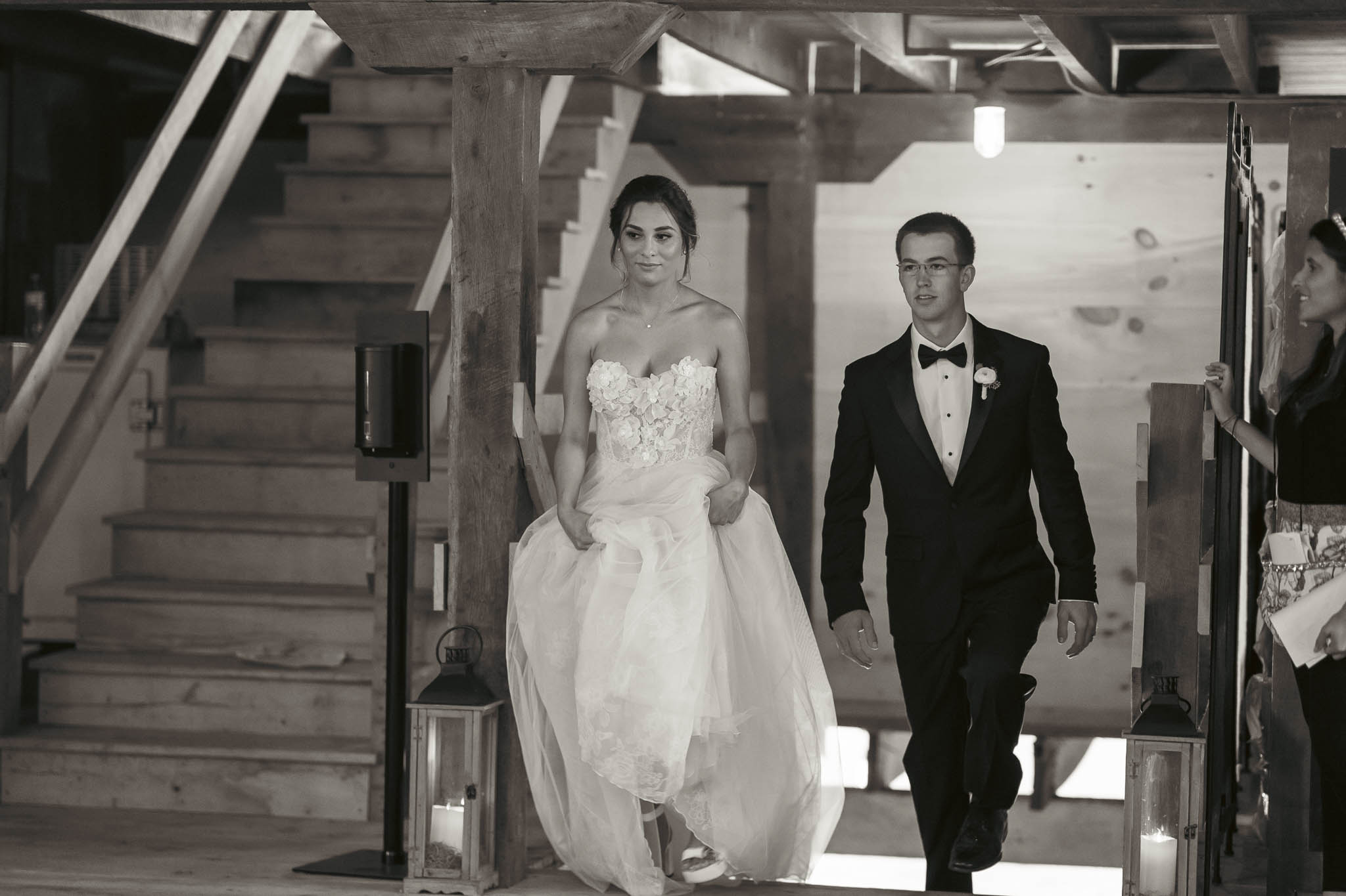 The couple walking into their barn reception — Sylvanside Farm wedding in Purcellville, Virginia