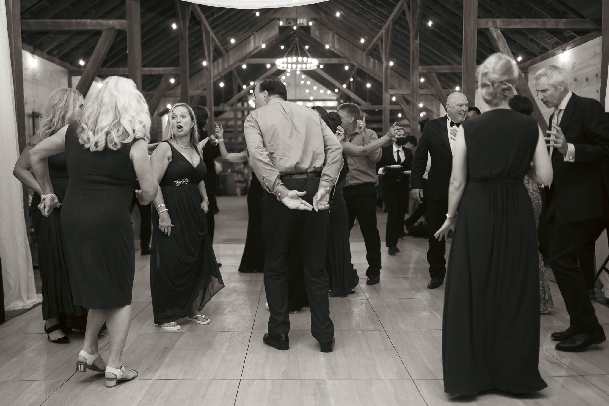 Black and white dance floor photograph at the barn reception — Sylvanside Farm wedding in Purcellville, Virginia